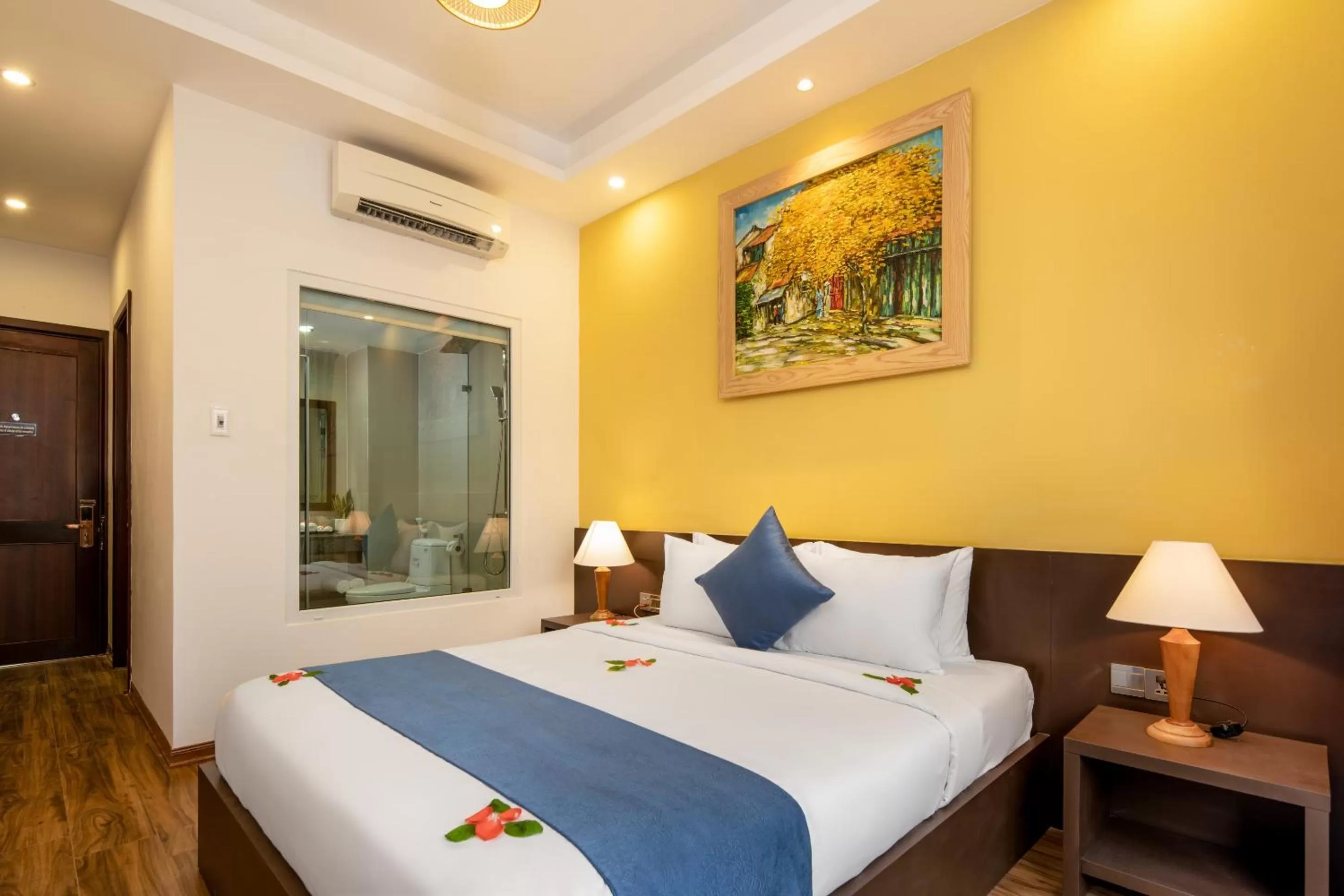 Photo of the whole room, Bed in TRIPLE Riverside Villa Hotel HoiAn