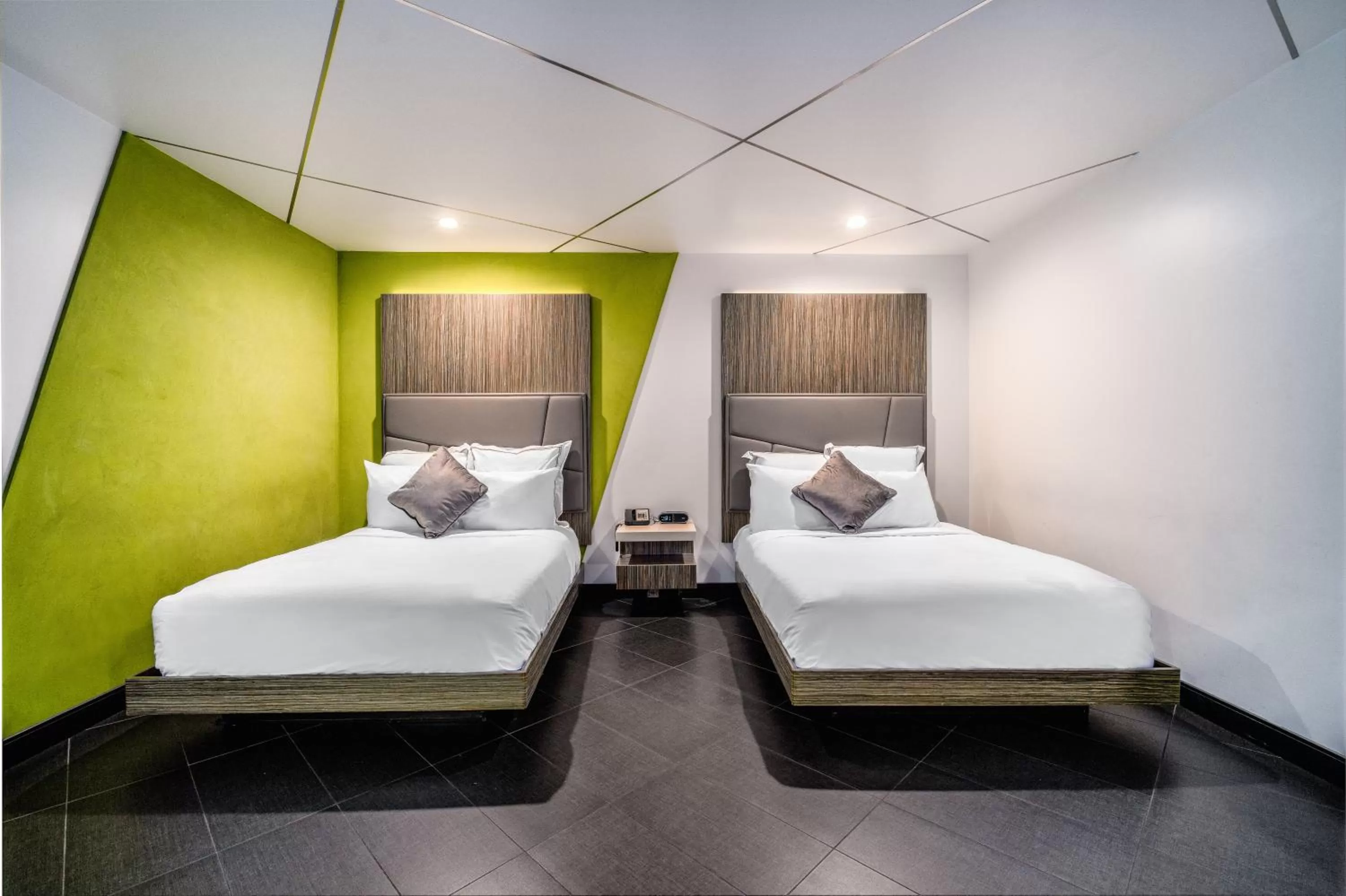 Bed in The Moment Hotel