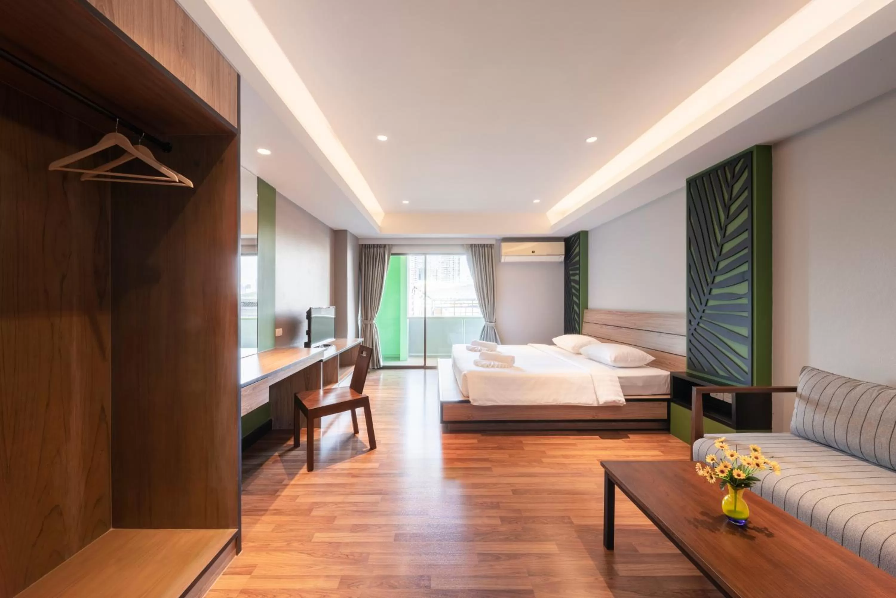 Bed in At 115 Hotel By Rompo