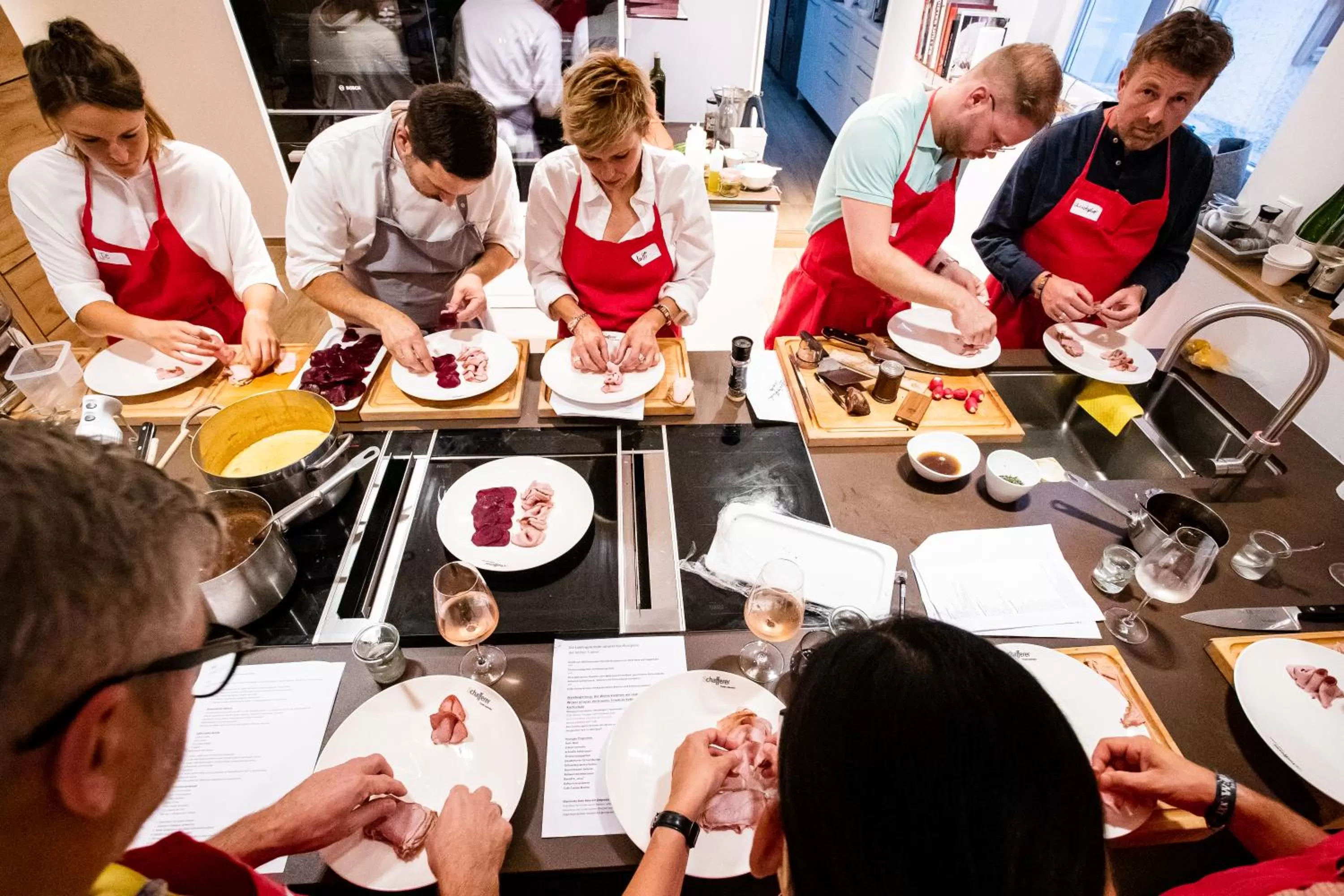 People in Hotel Restaurant Kochschule Rössle