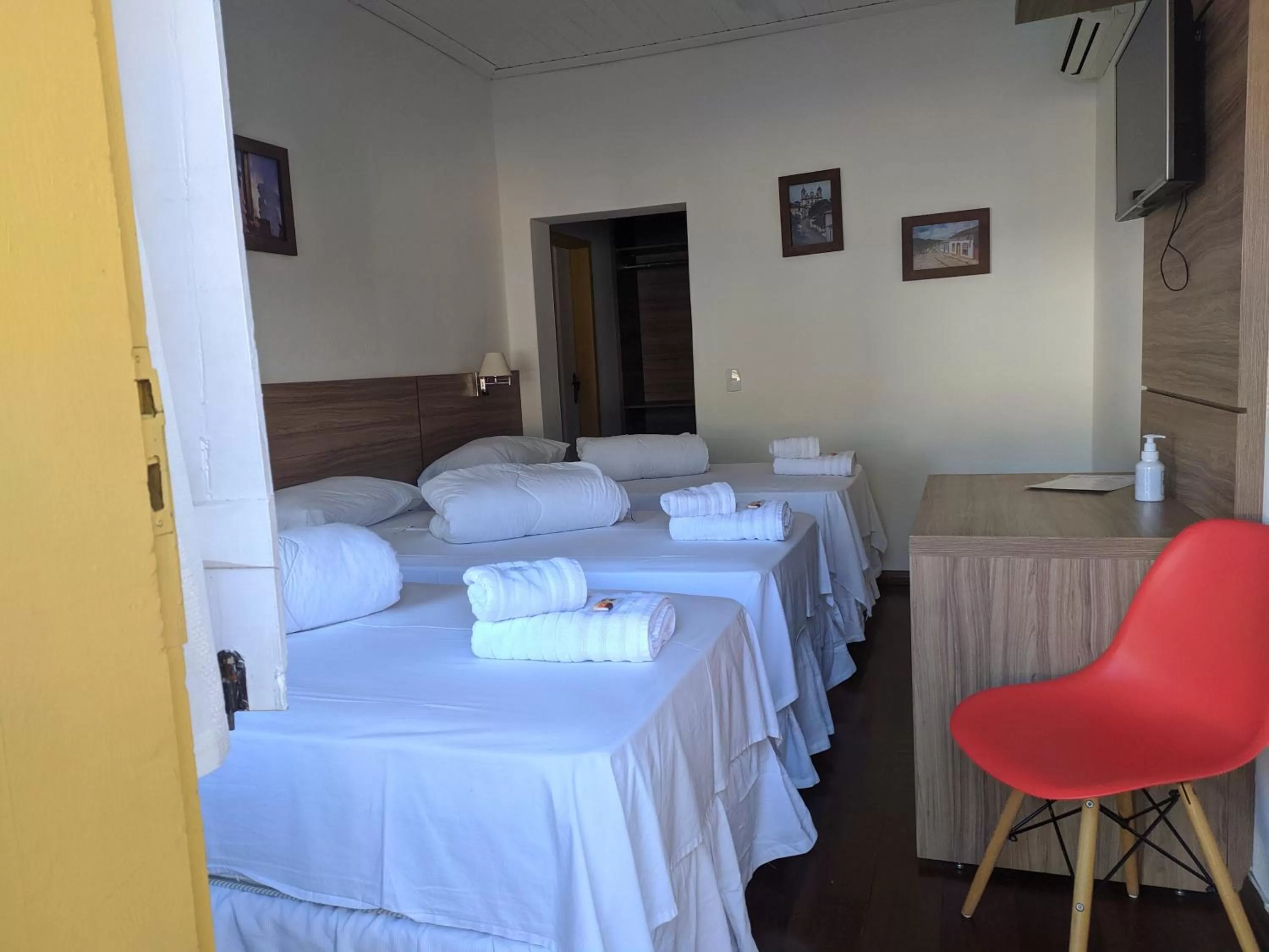 Bed in Pousada o Amanhecer