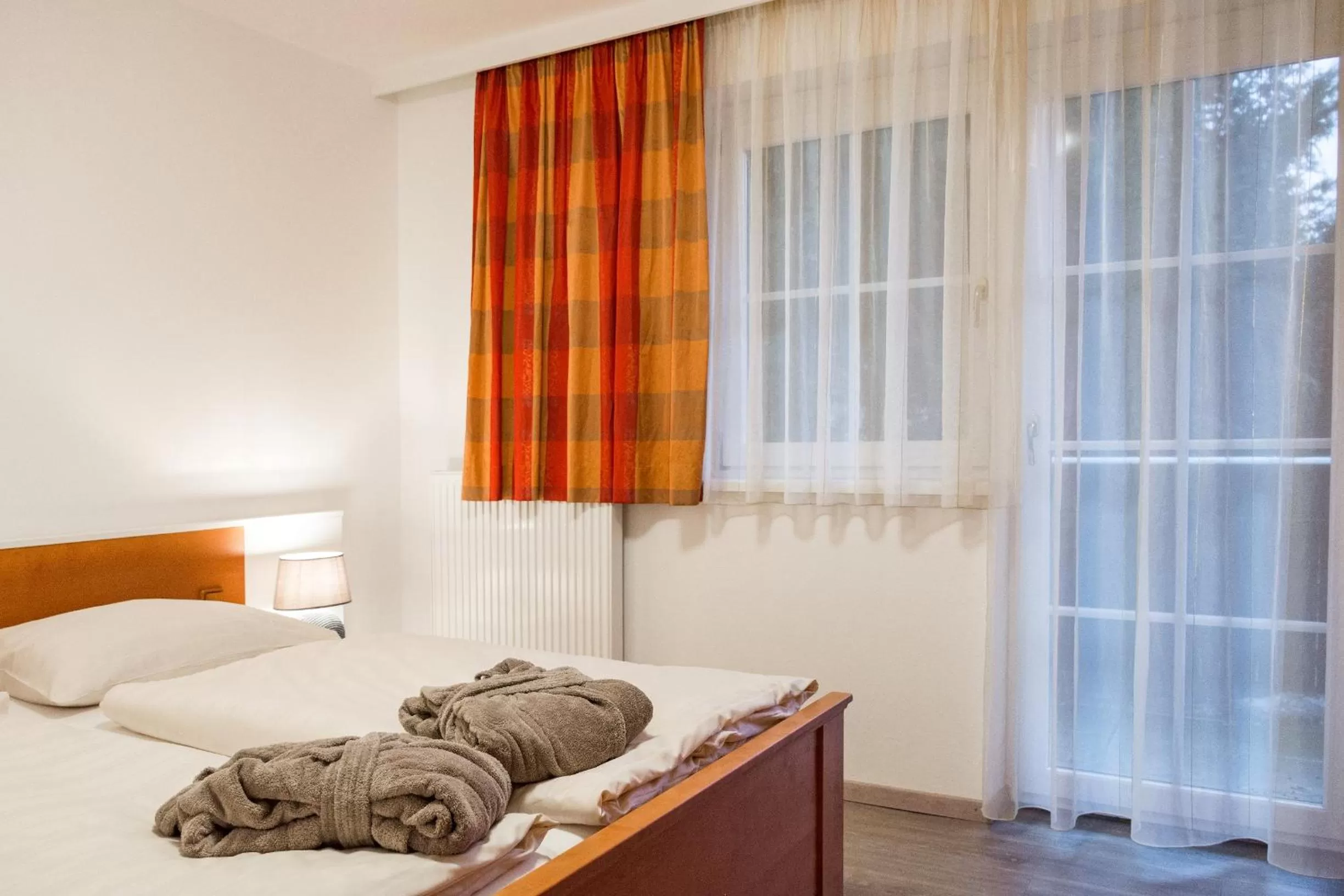 Photo of the whole room, Bed in Landhotel Post Ebensee am Traunsee ***S