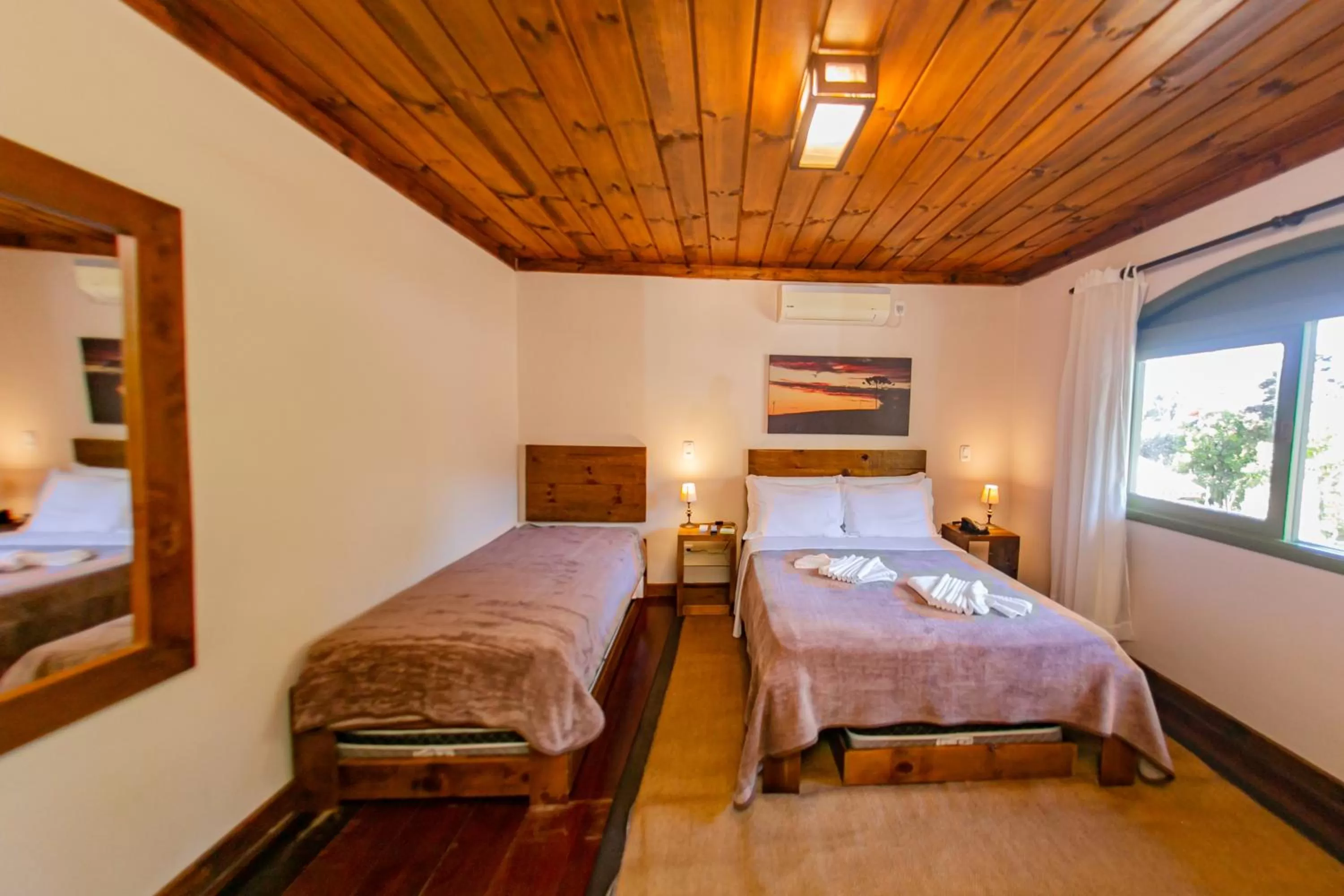 Bed in Pousada Charm Canela