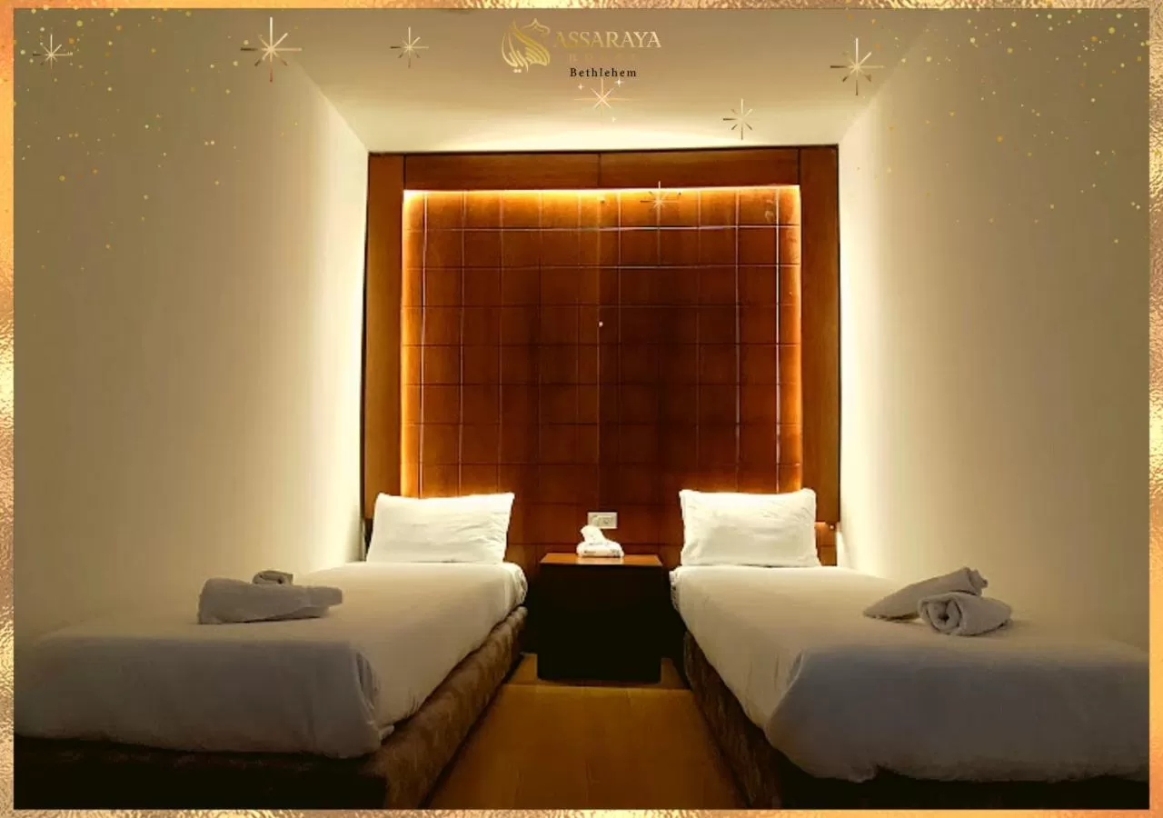 Bed in Assaraya Palace Hotel