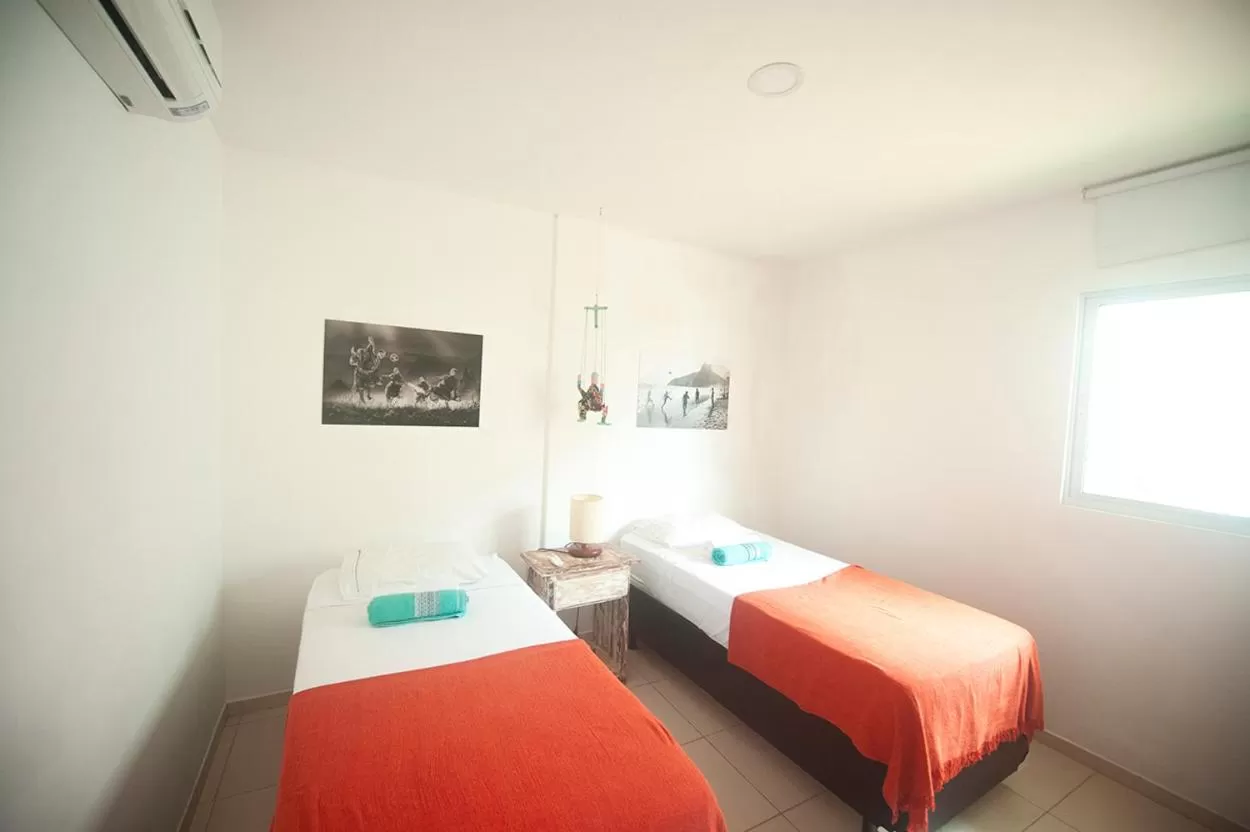 Bed in Manga Verde Beach Residence