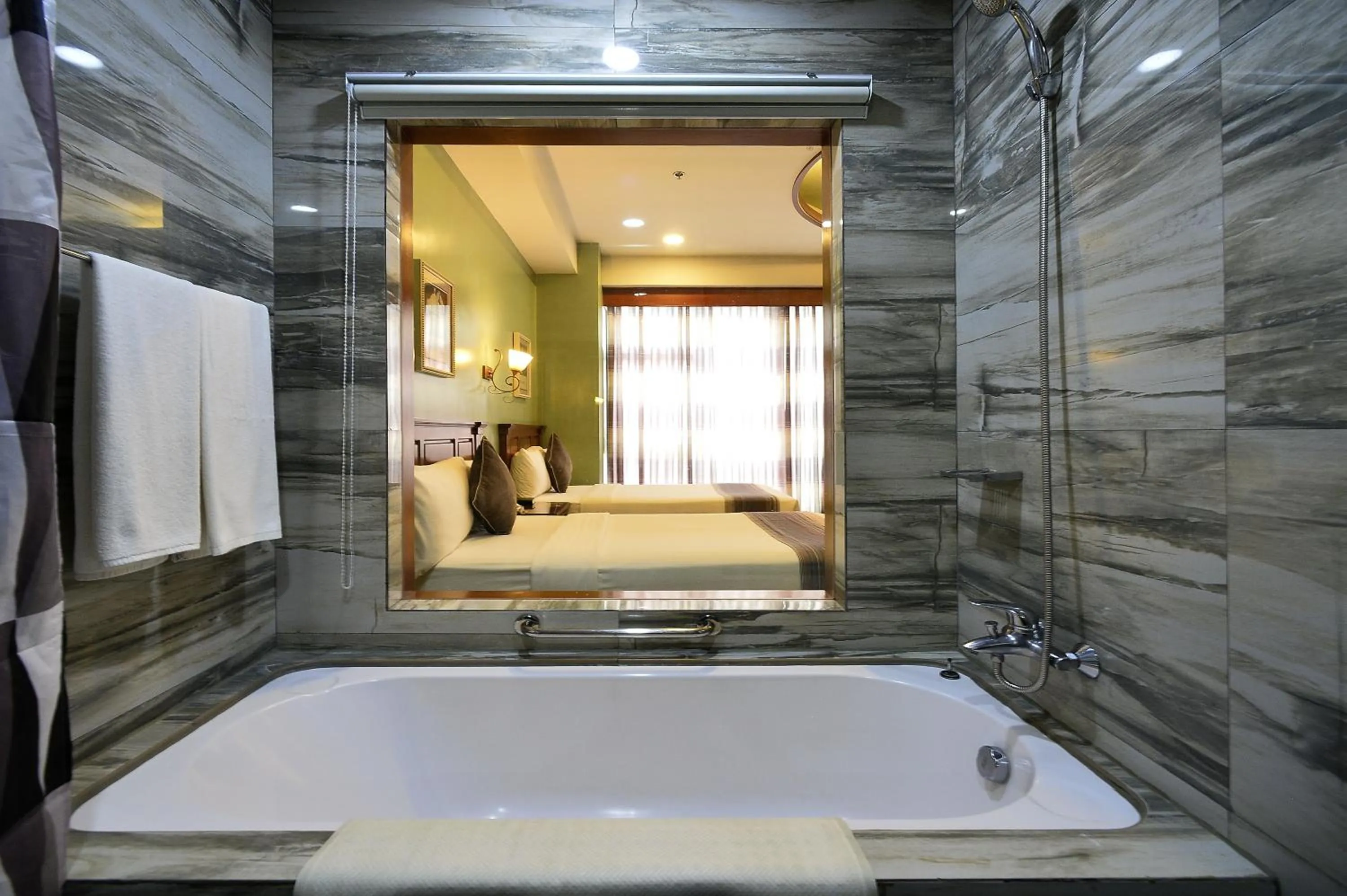 Bathroom in Paragon Hotel and Suites