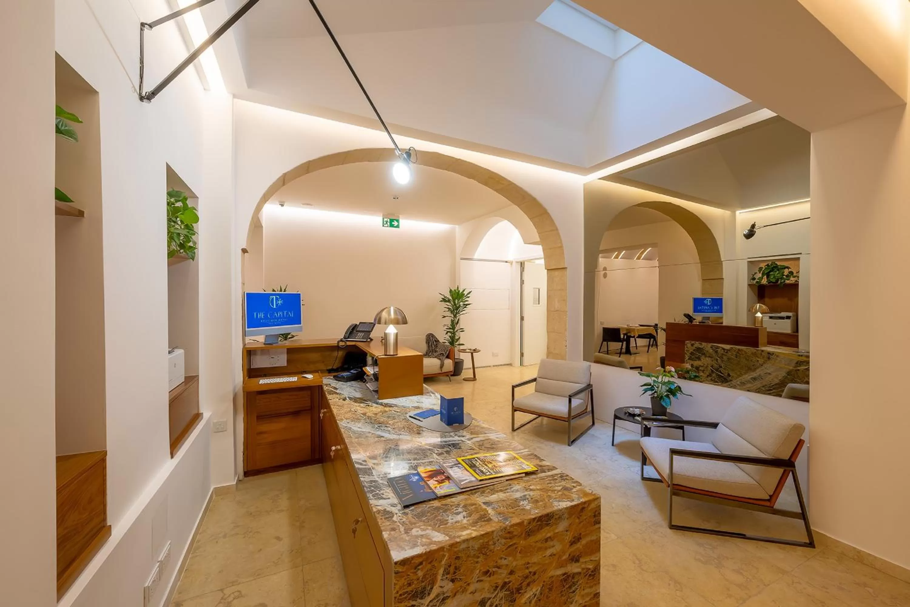 Lobby or reception in The Capital Boutique Hotel