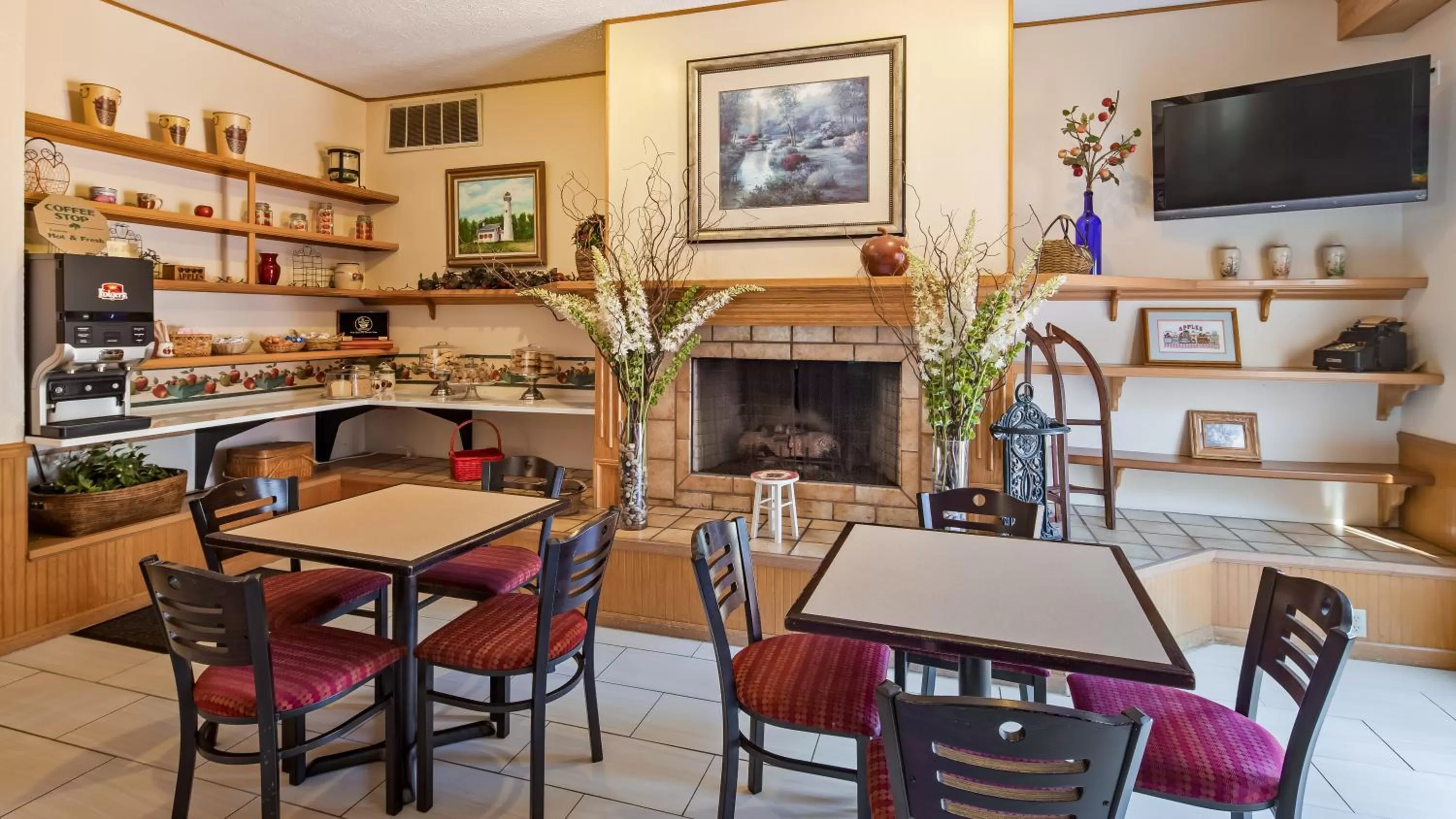 Dining area in Apple Tree Inn; SureStay Collection by Best Western