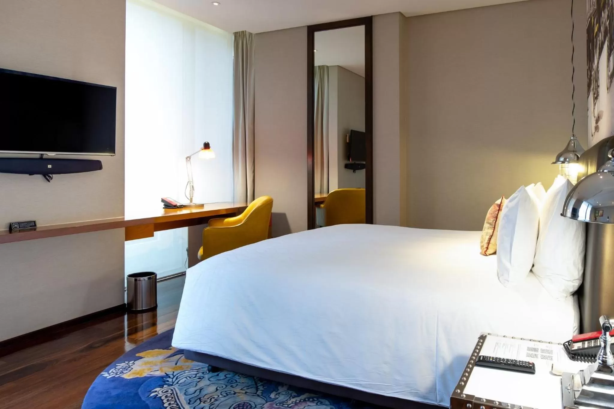 Photo of the whole room, Bed in Hotel Indigo Bangkok Wireless Road by IHG