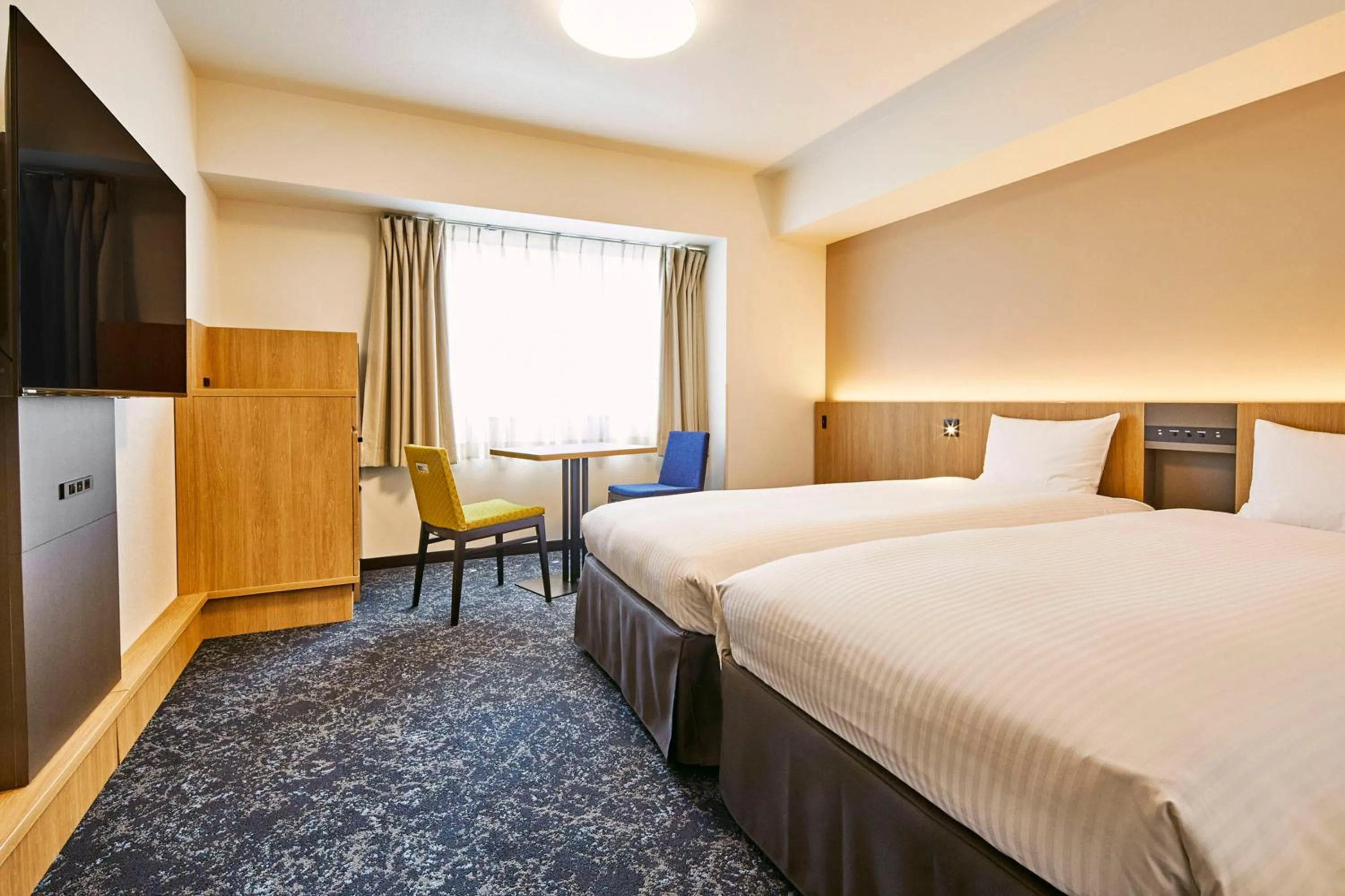 Bed in Hotel Lumiere Kasai