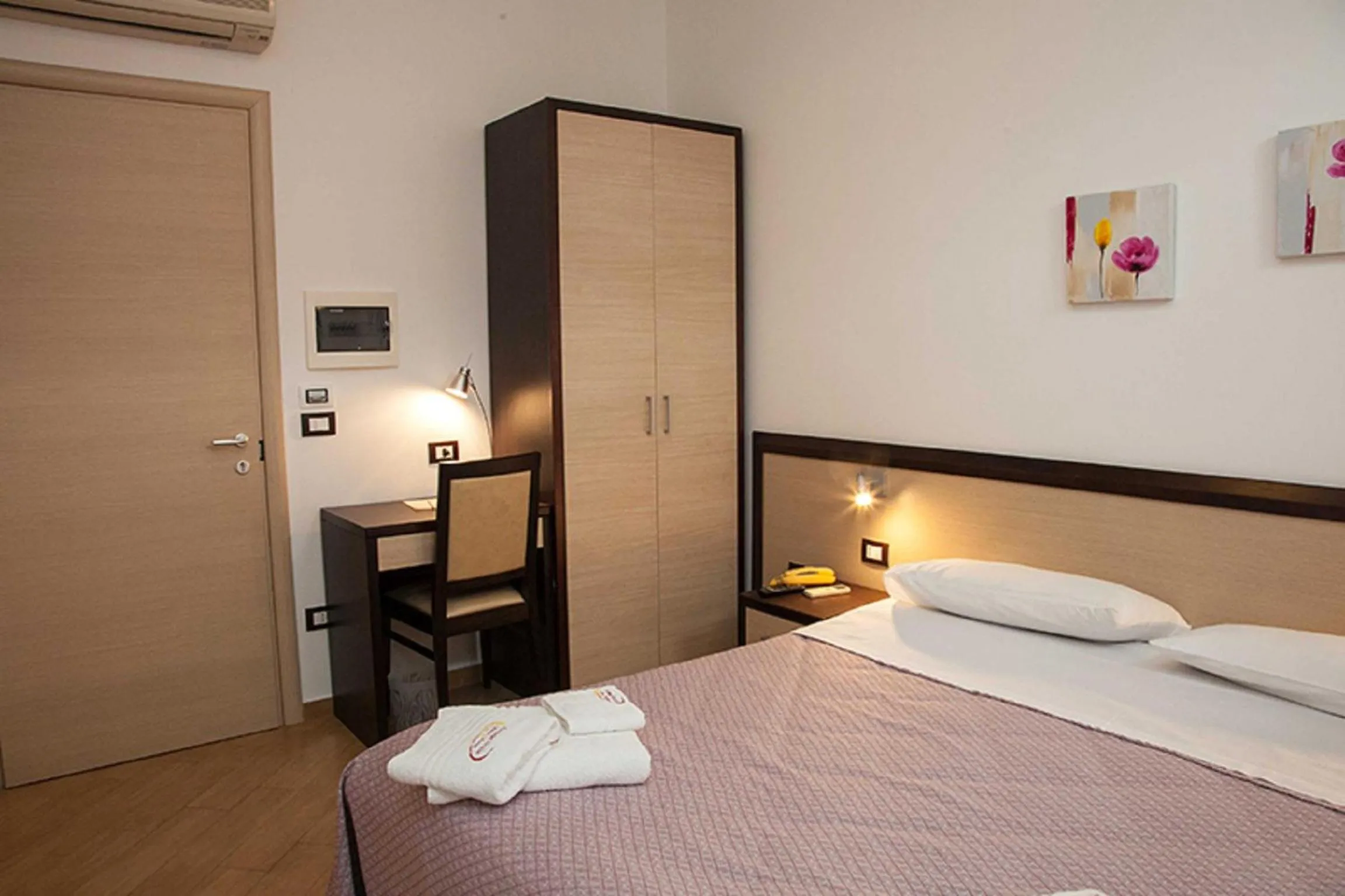 Bed in Albergo Perseo