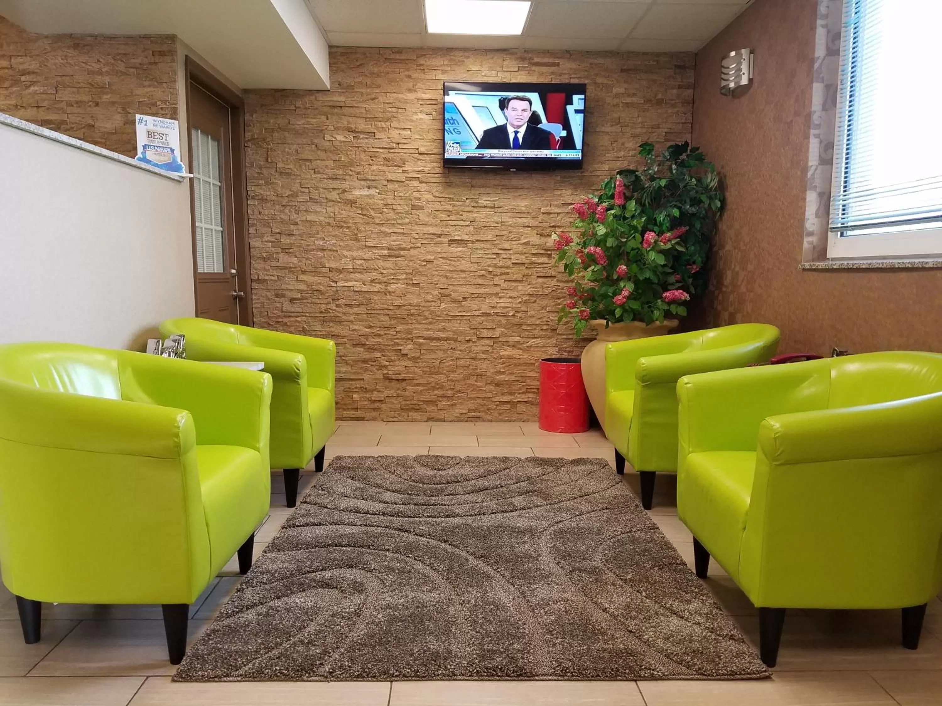 Seating area in Super 8 by Wyndham Plattsburgh