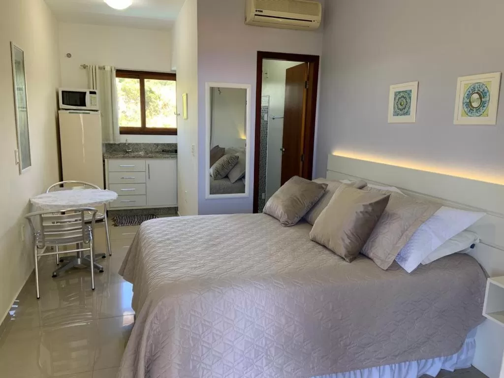 Bed in Pousada Mar de Cristal