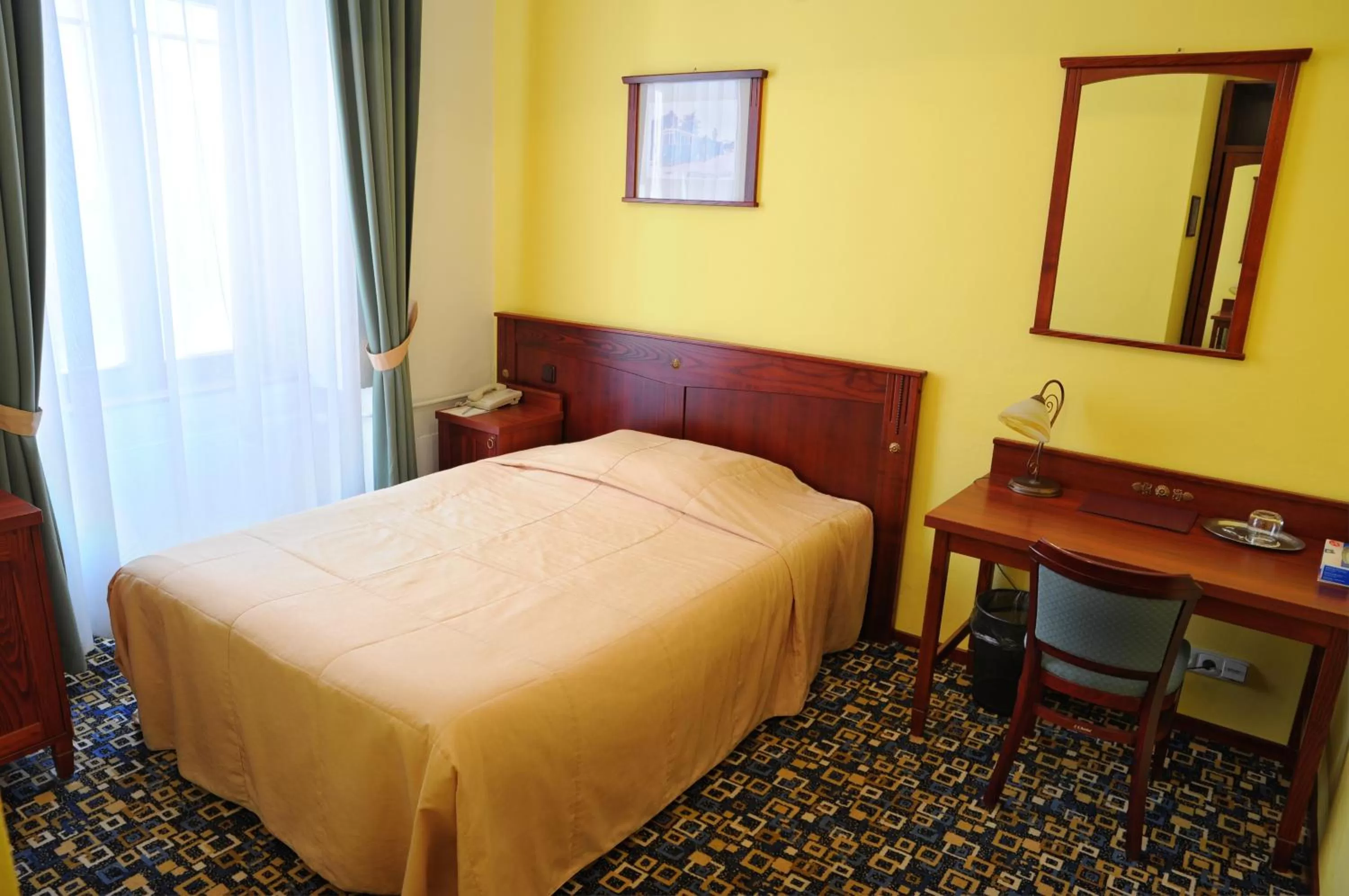 Bed in Grandhotel Garni