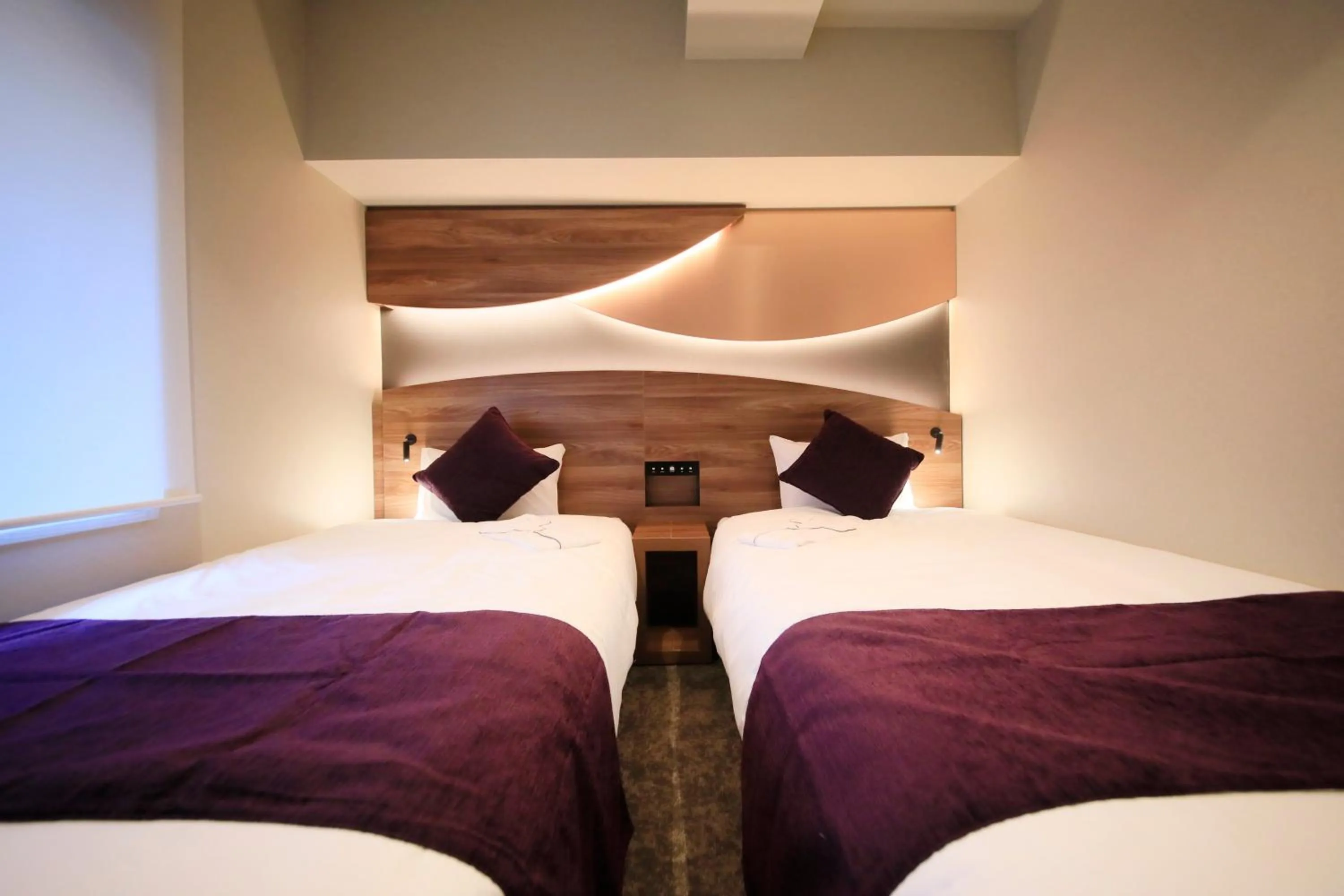 Bed in Quintessa Hotel Tokyo Ginza