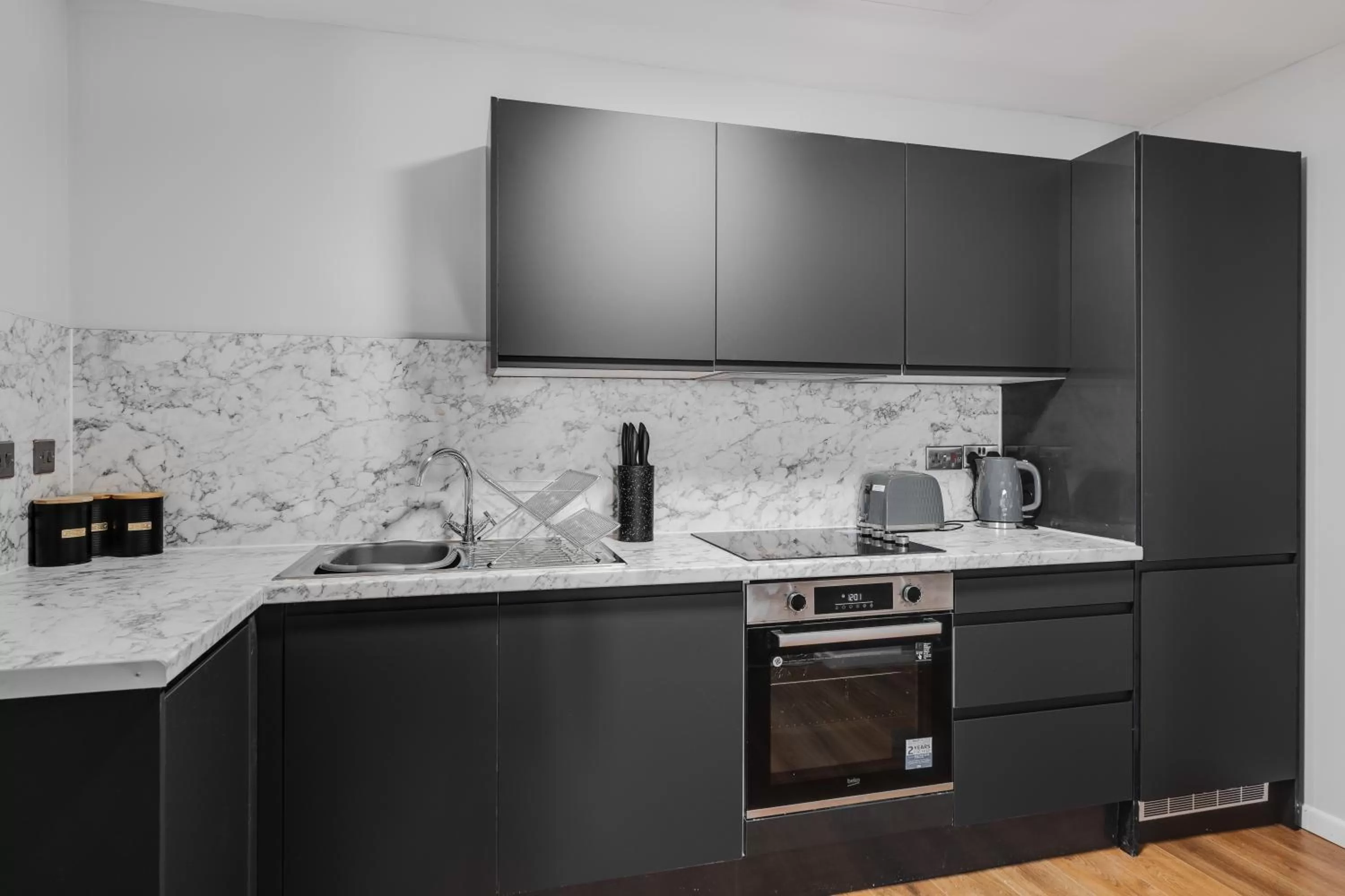 Kitchen or kitchenette in Stanley St Suites By GuestFirst