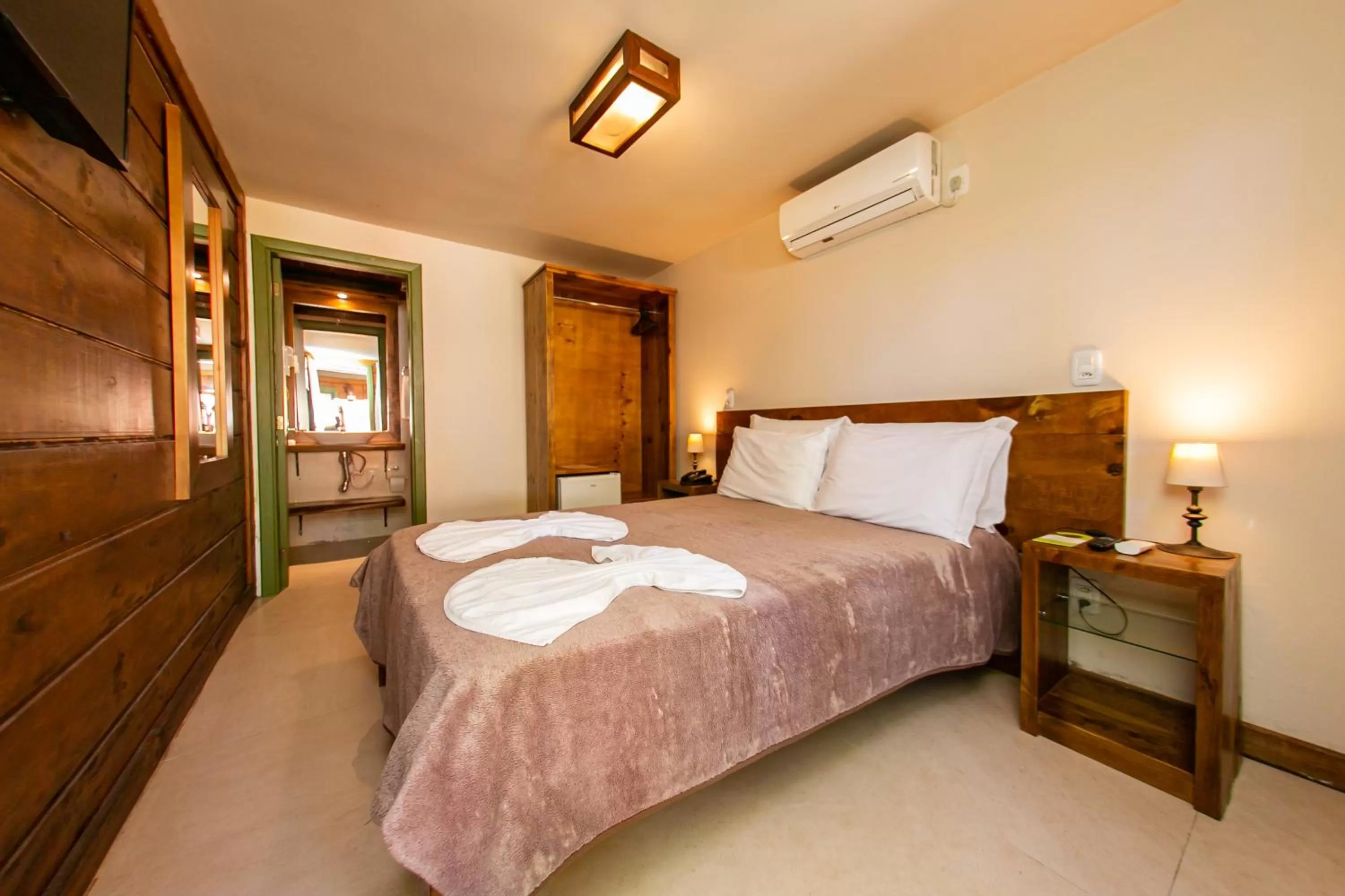 Bed in Pousada Charm Canela