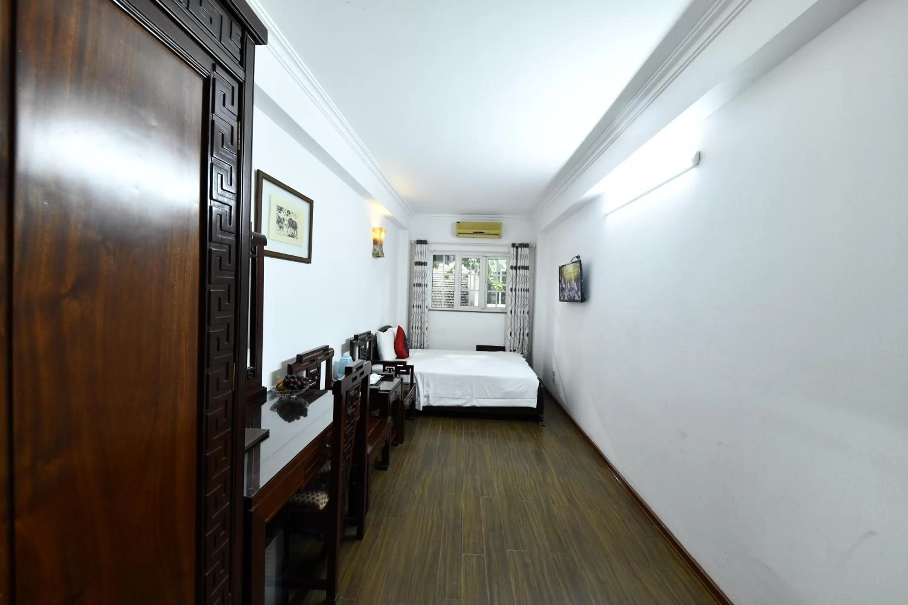 Bed in Phoenix Legend Hotel Hanoi