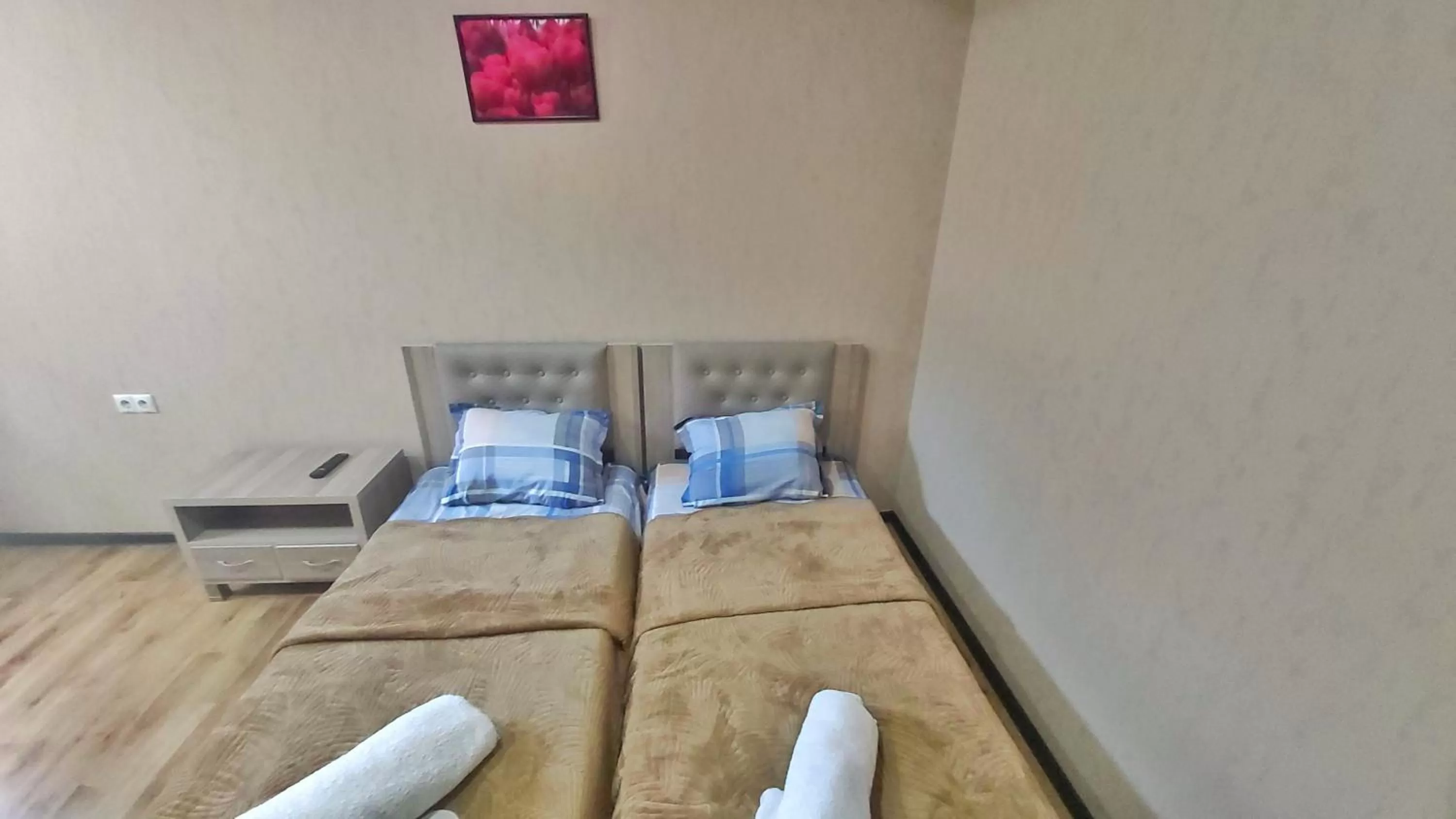 Bed in Gamarjoba Hotel