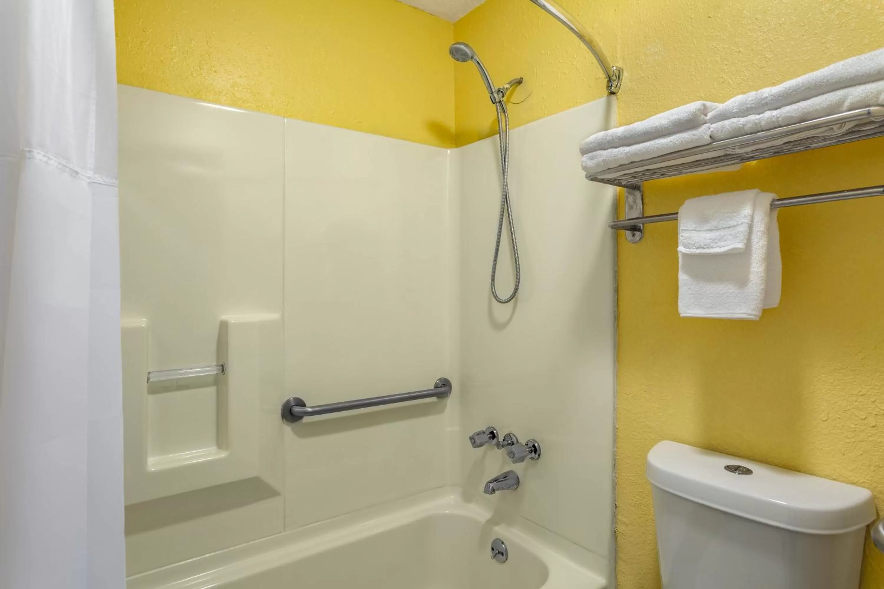 Bathroom in Days Inn by Wyndham Greensboro Airport