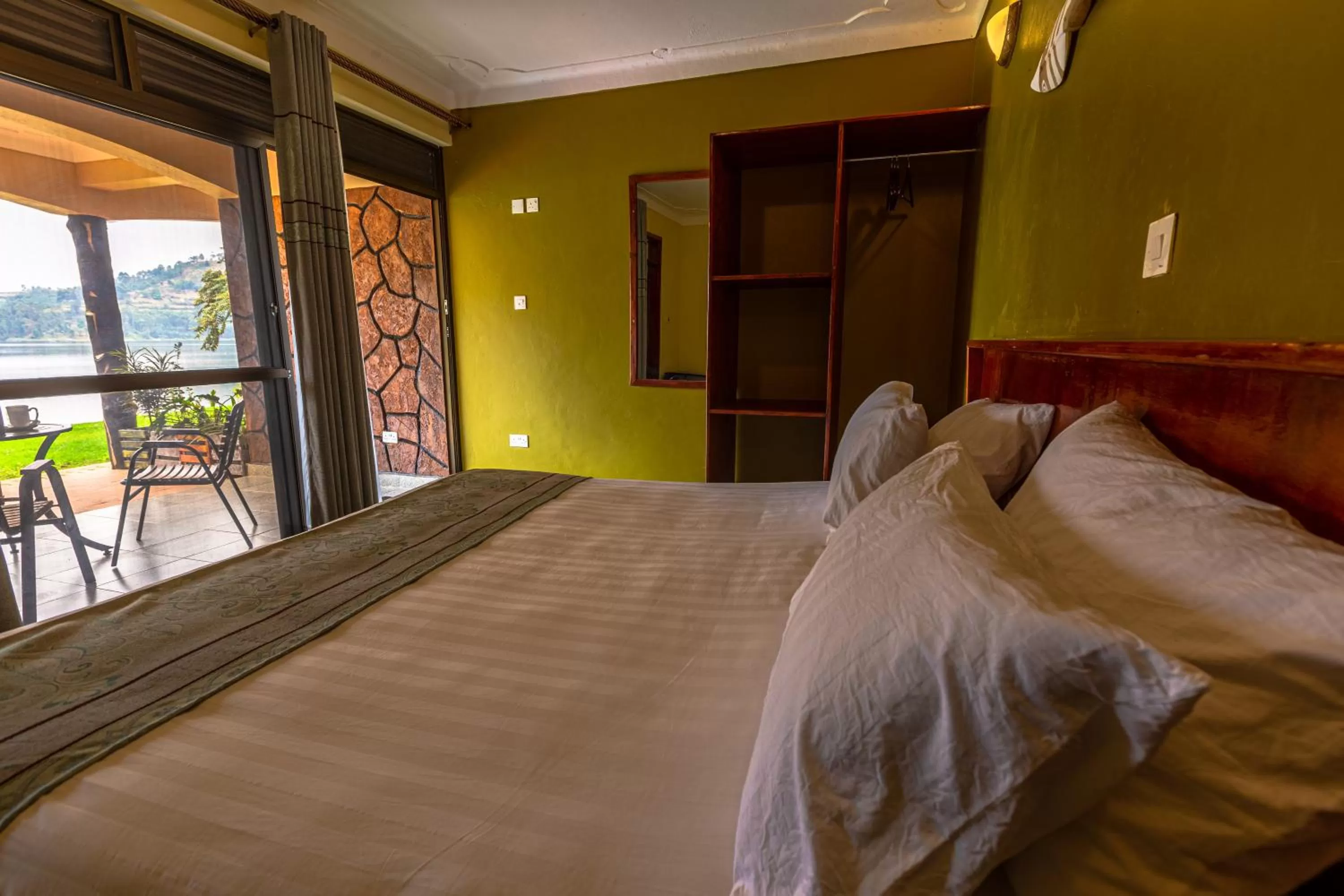 Bed in Bunyonyi Overland Resort