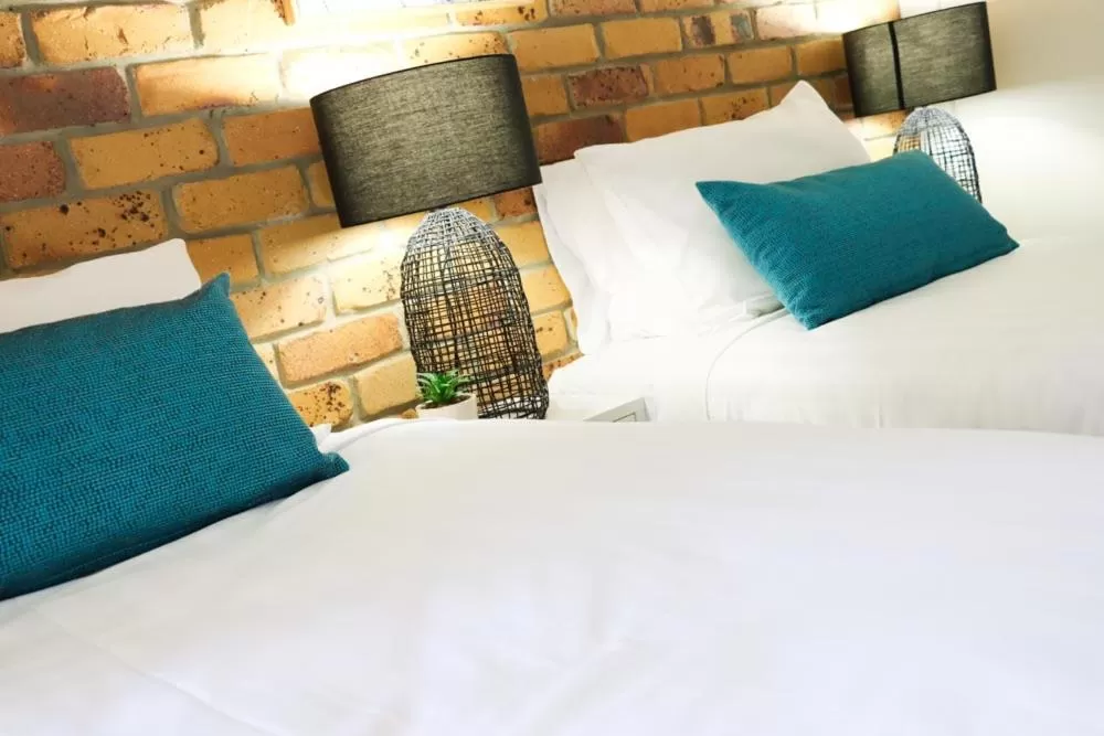 Bed in Kennedy Drive Boutique Motel - Close To City Centre & Airport