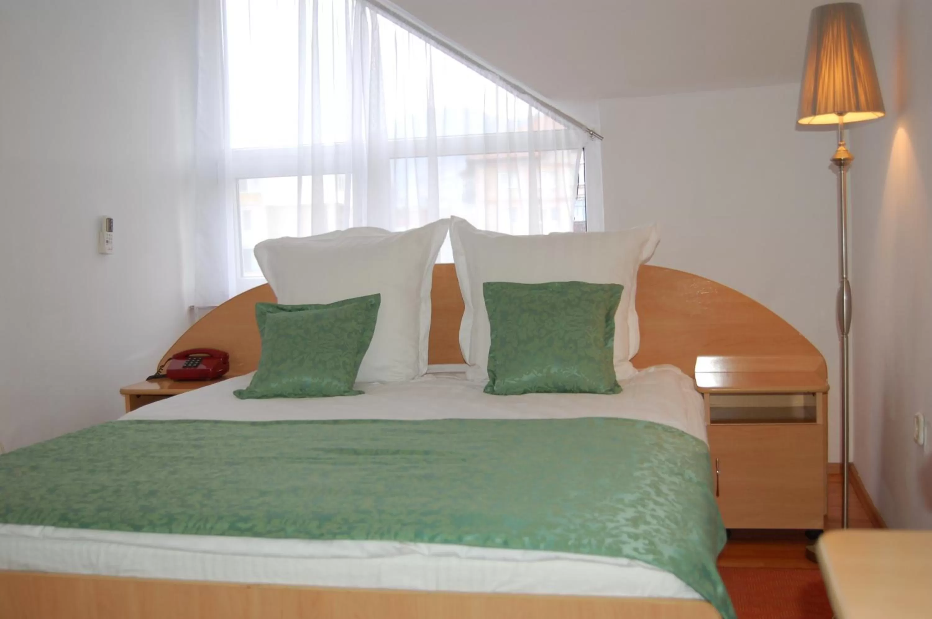 Bed in Motel Maestro