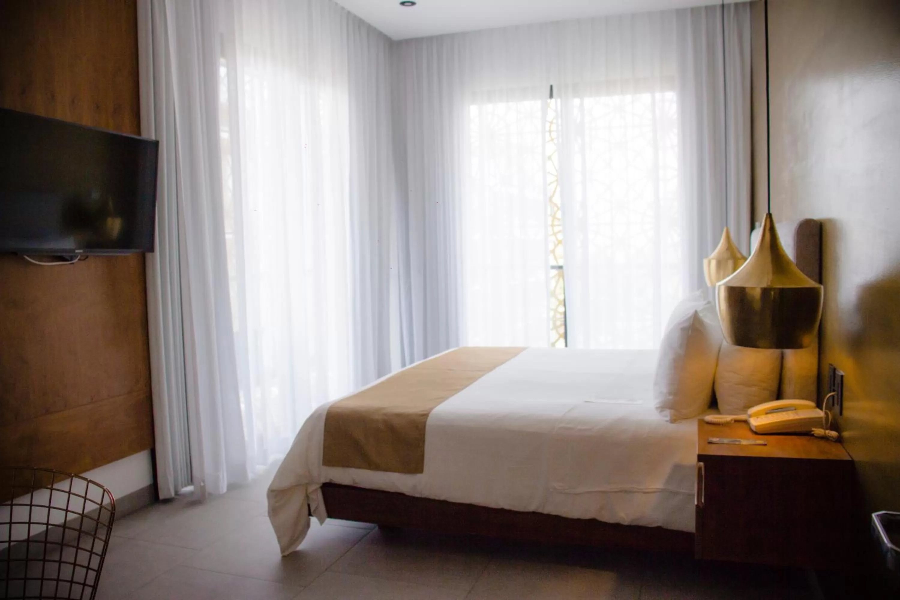 Communal lounge/ TV room, Bed in IT Boutique Hotel & Restaurant