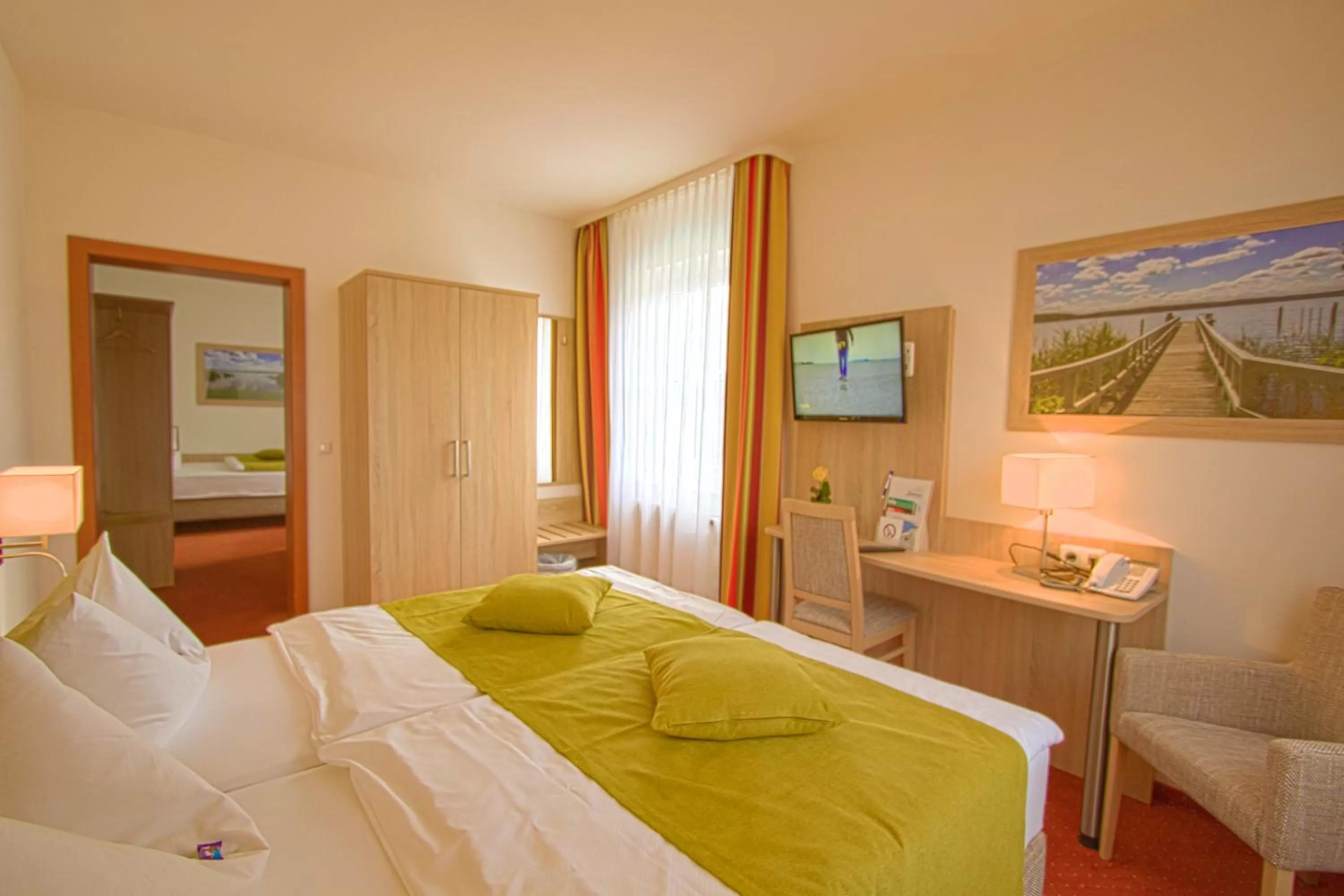 Photo of the whole room, Bed in Falk Seehotel Plau am See