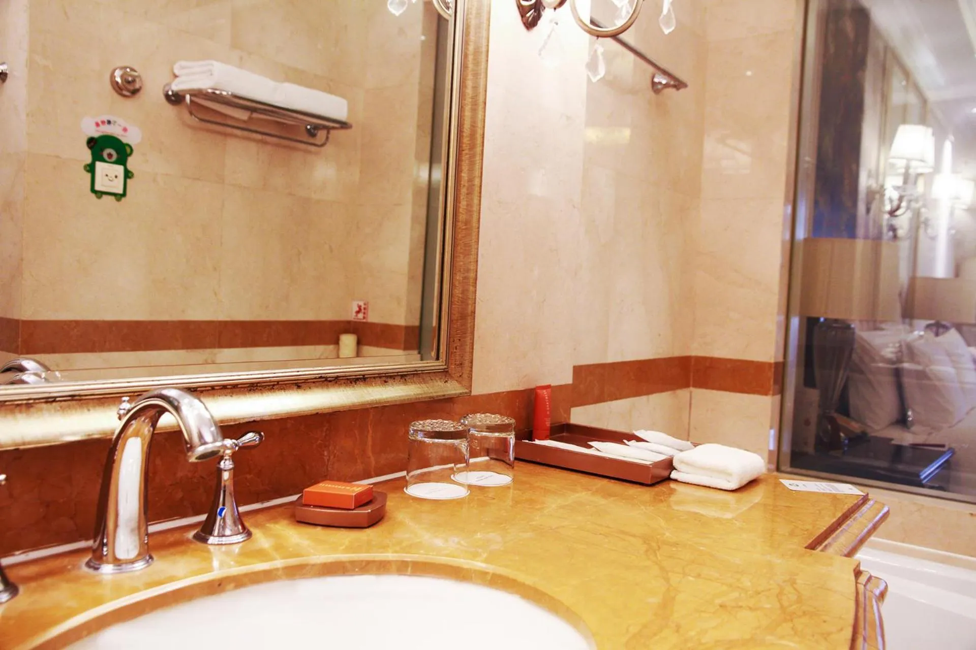 Toilet in Crowne Plaza Ocean Spring Resort by IHG