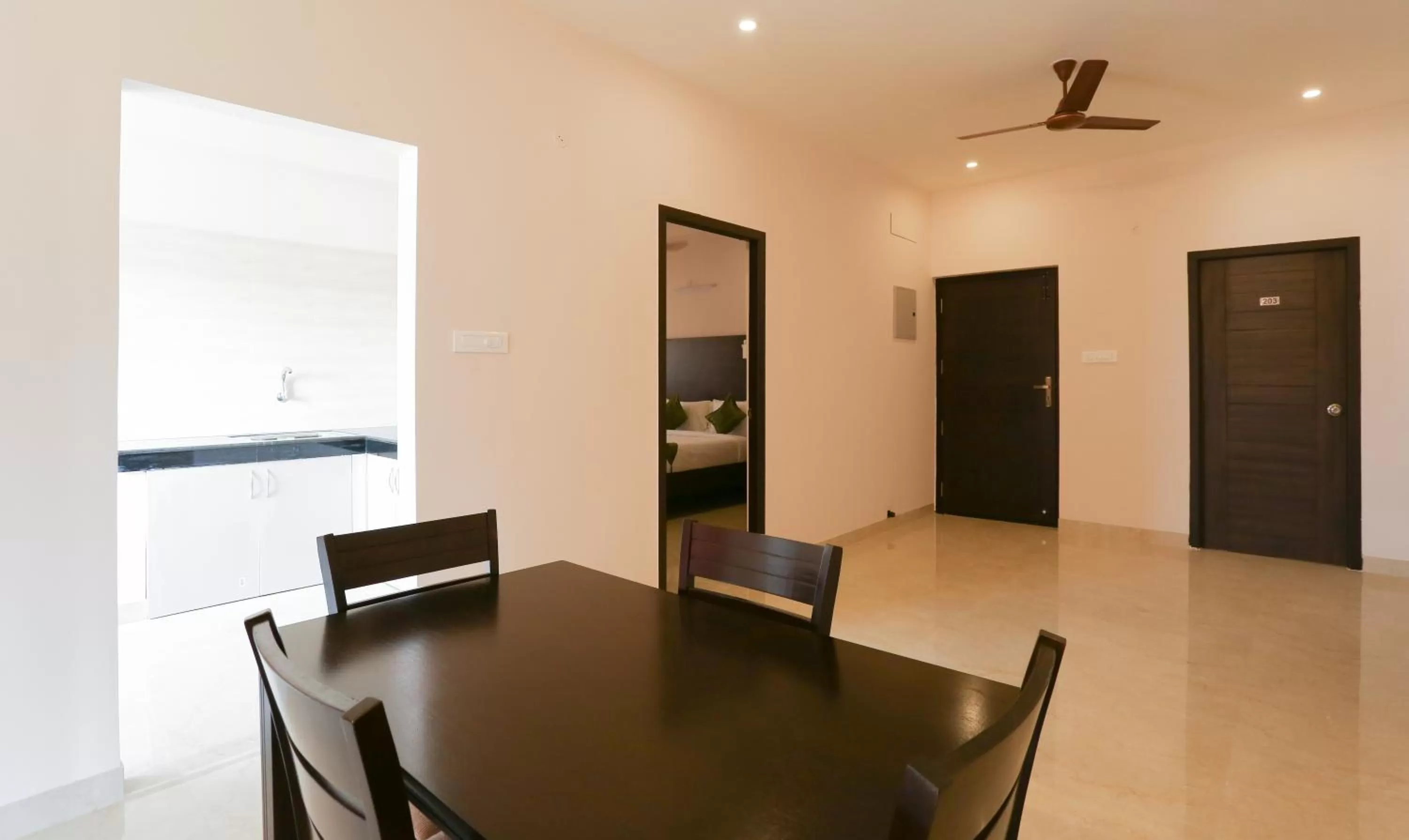 Dining area in Treebo Hi Line Apartments Kalapatti