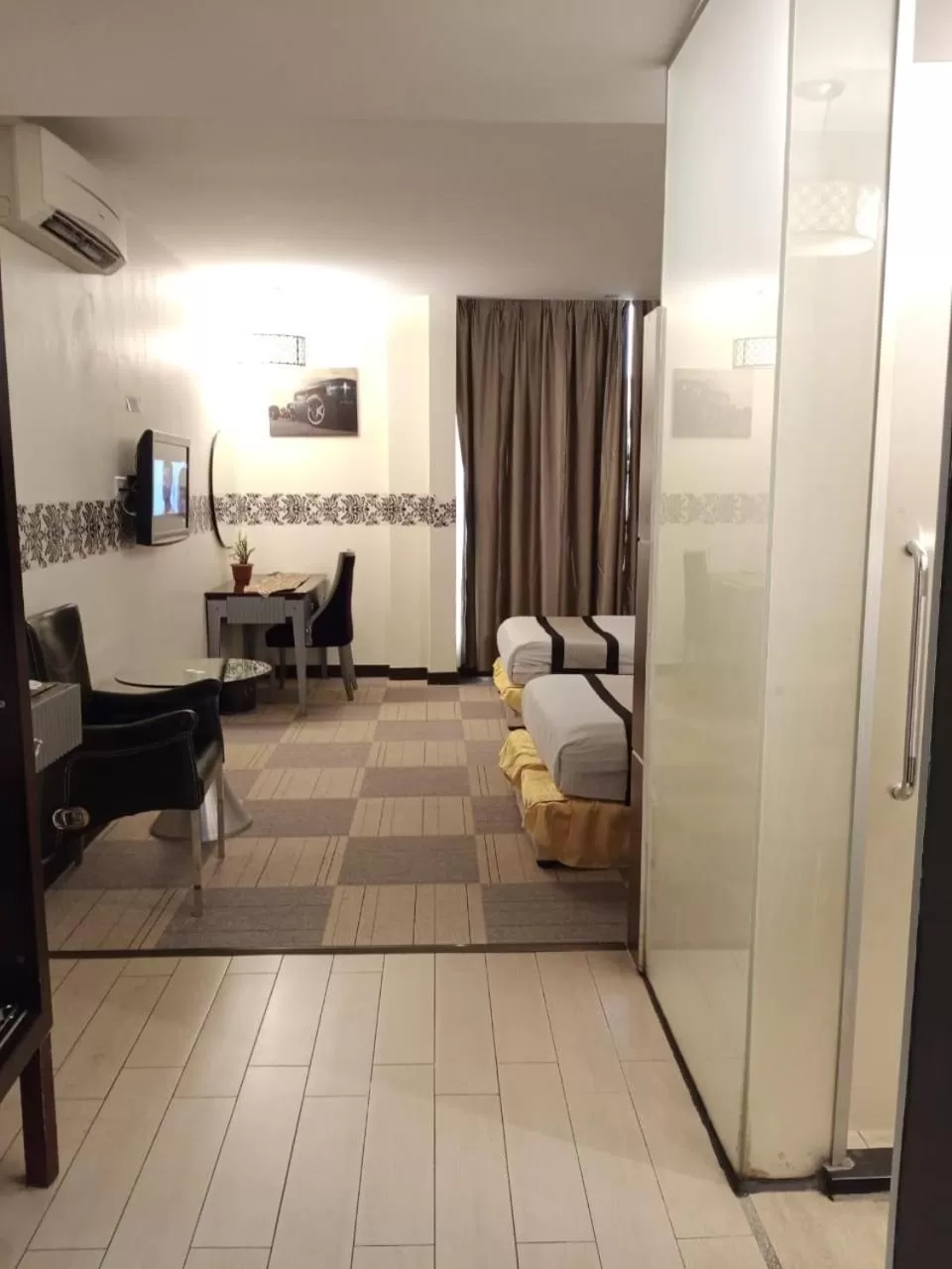 air conditioner, Bed in Shervinton Executive Boutique Hotel