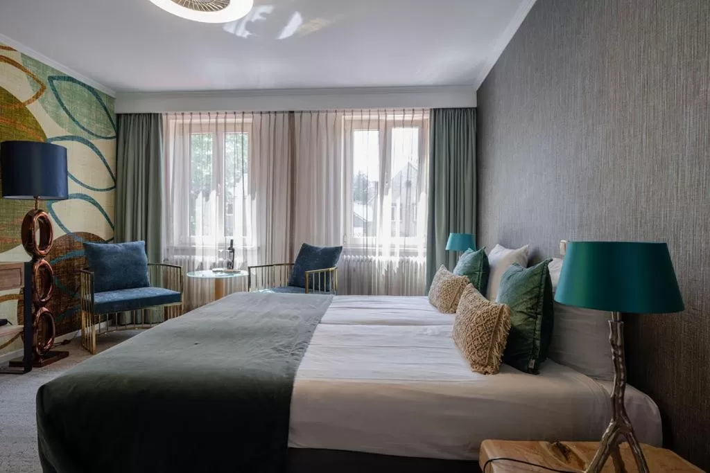 Bed in Boutique Hotel Slenaker Vallei - Buitengewoongenieten