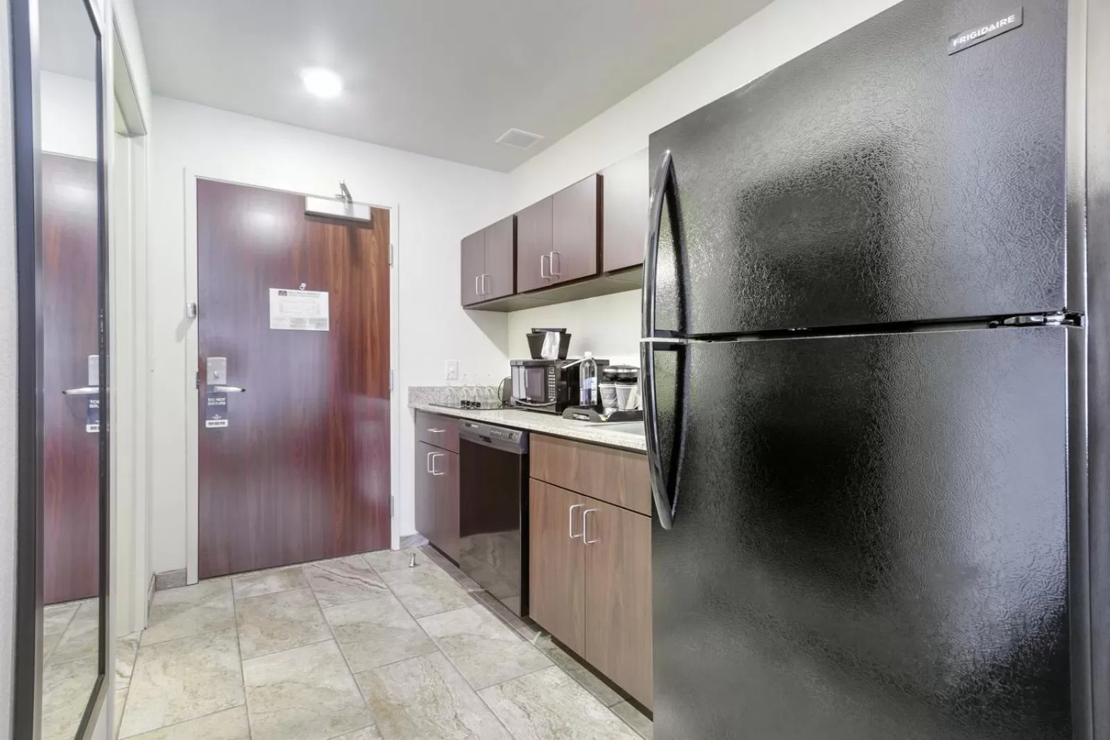 Kitchen or kitchenette in Cobblestone Hotel & Suites - Janesville