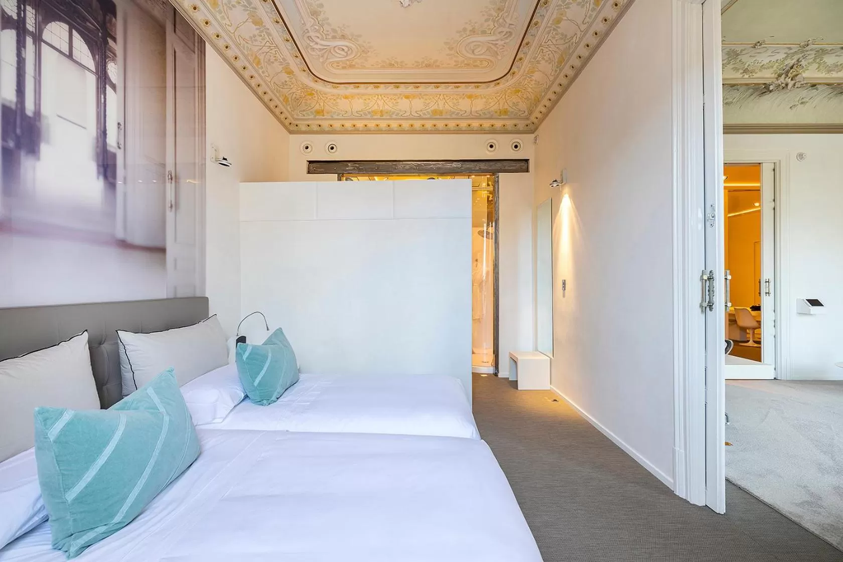 Bed in El Palauet Modernist Suites Barcelona