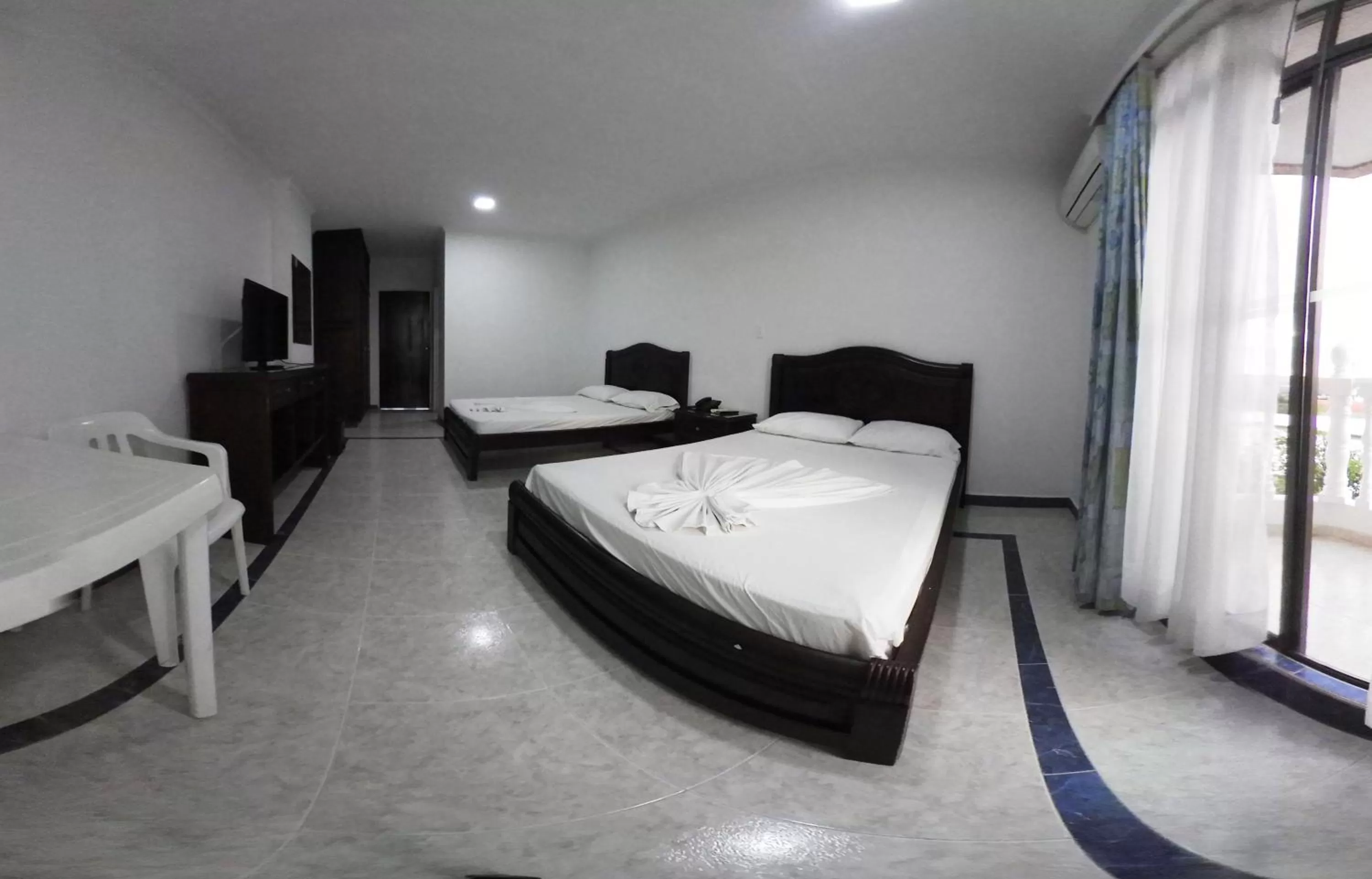 Bed in Zahira Hotel Melgar