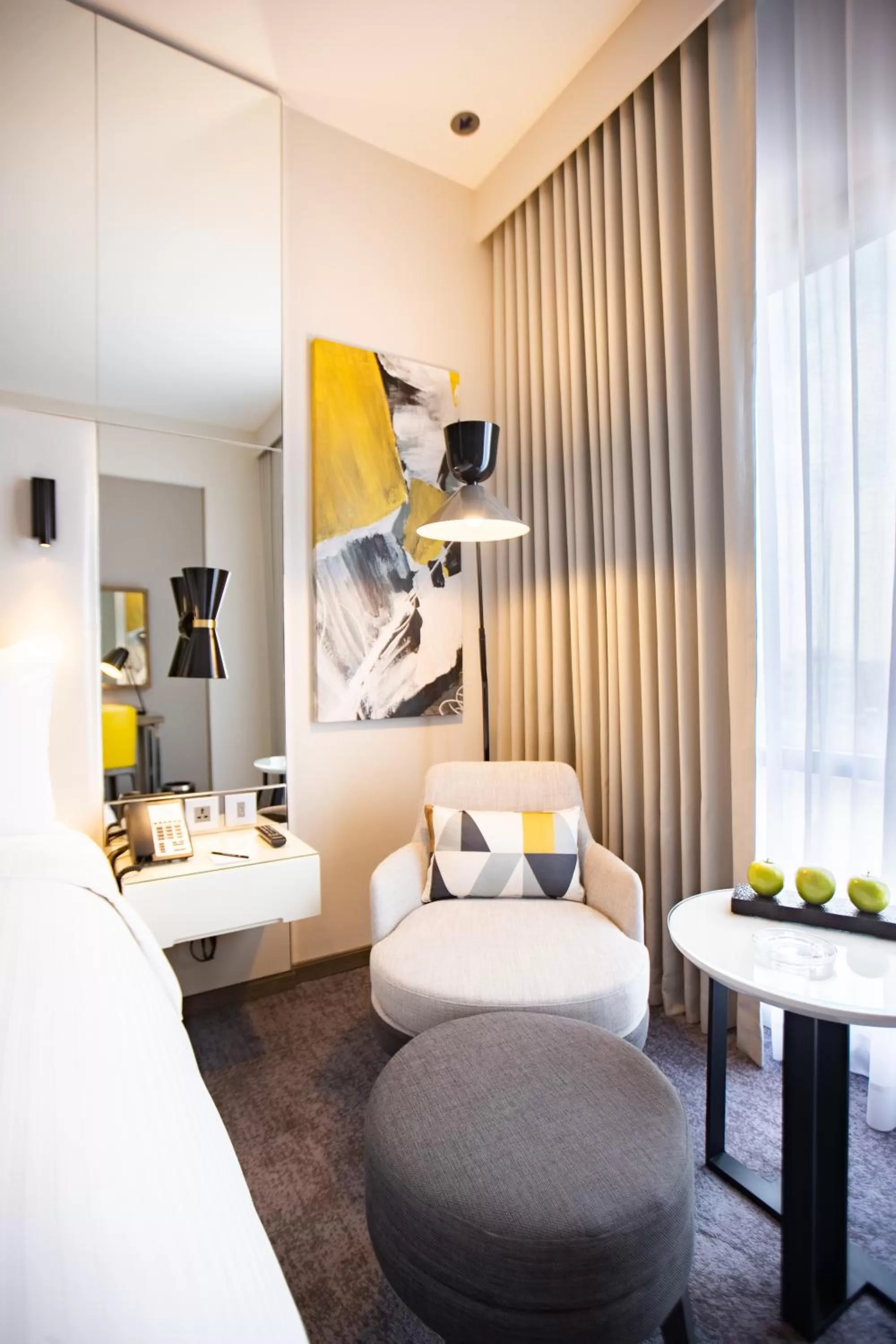 Seating area, Bed in Centro Mada Amman by Rotana