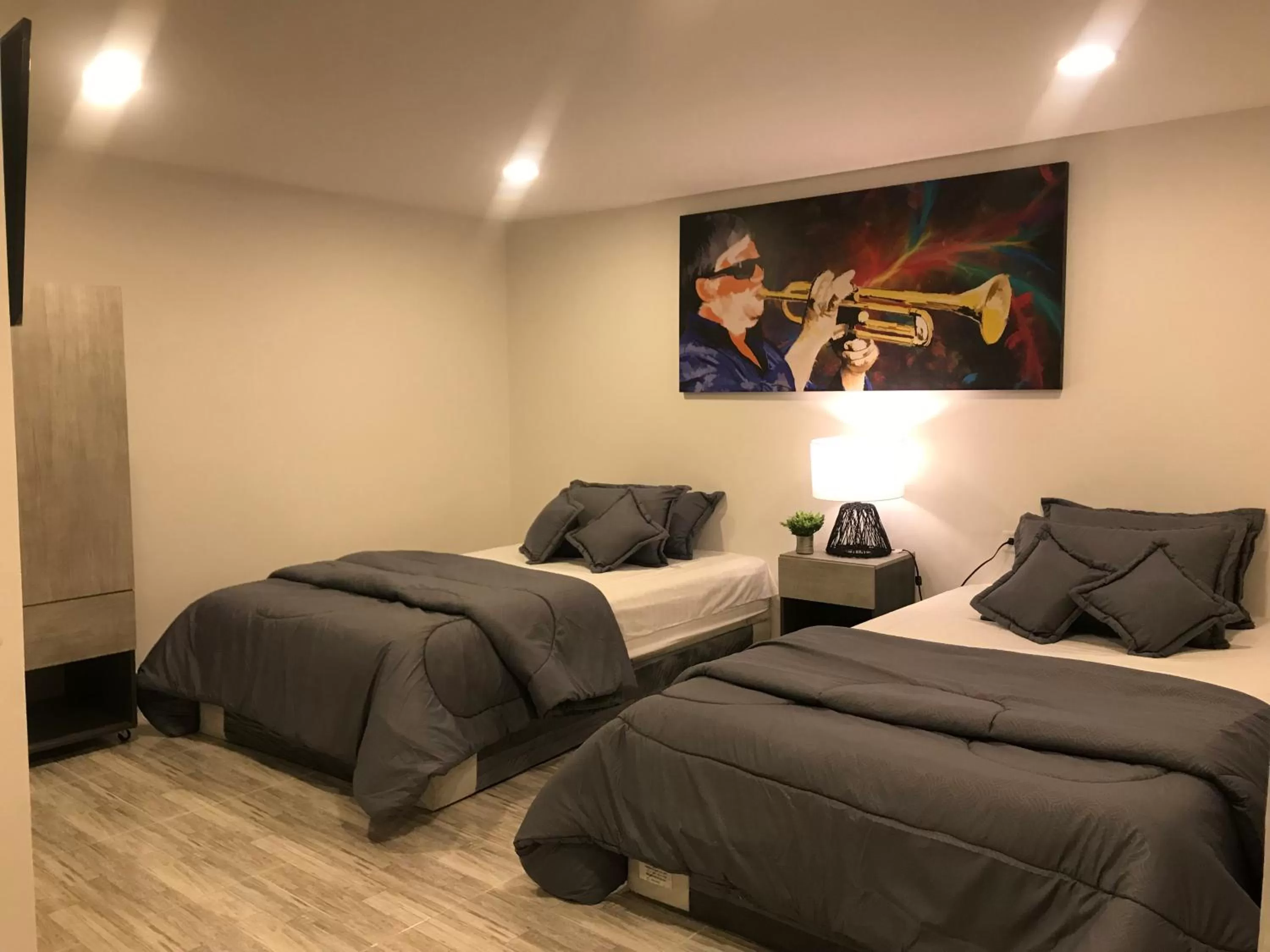 Bed in Bahia 79 Apartasuites Cerca al Centro