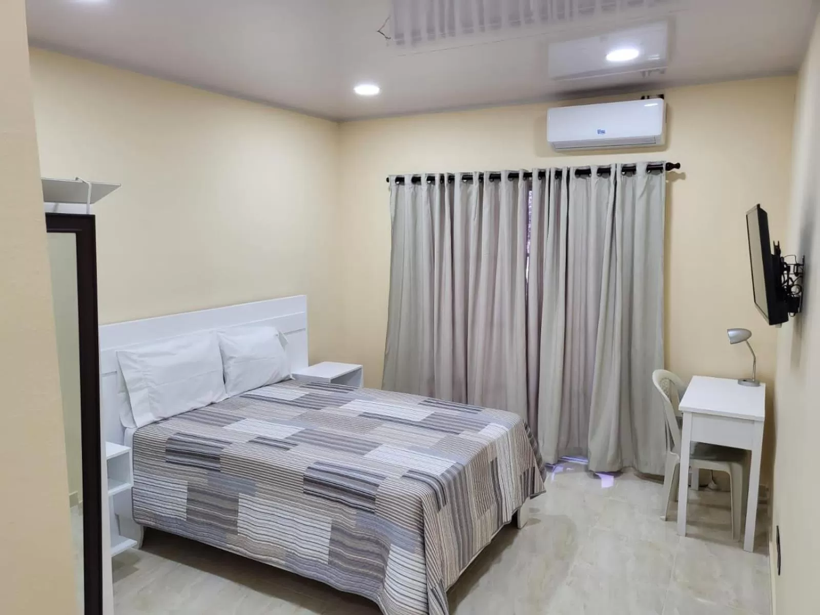 Bed in Apartahotel MACADANA