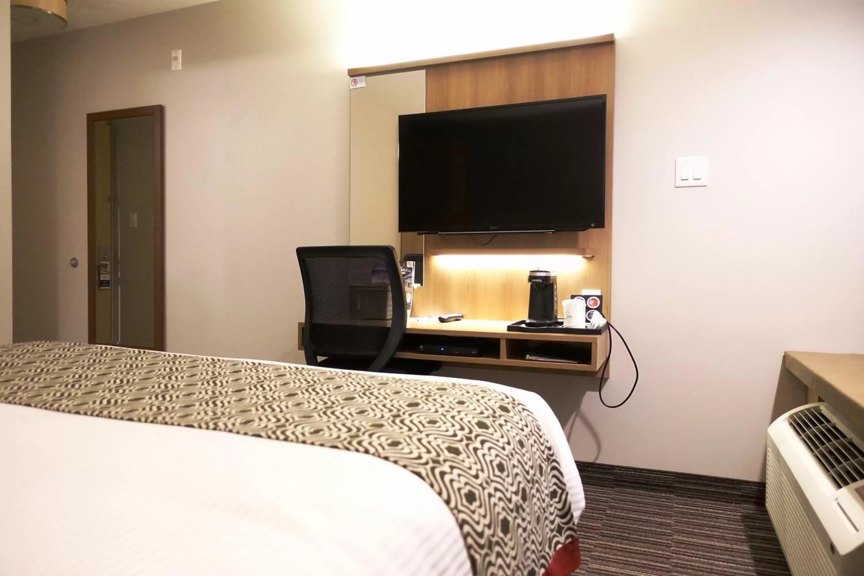 Bed in Microtel Casselman