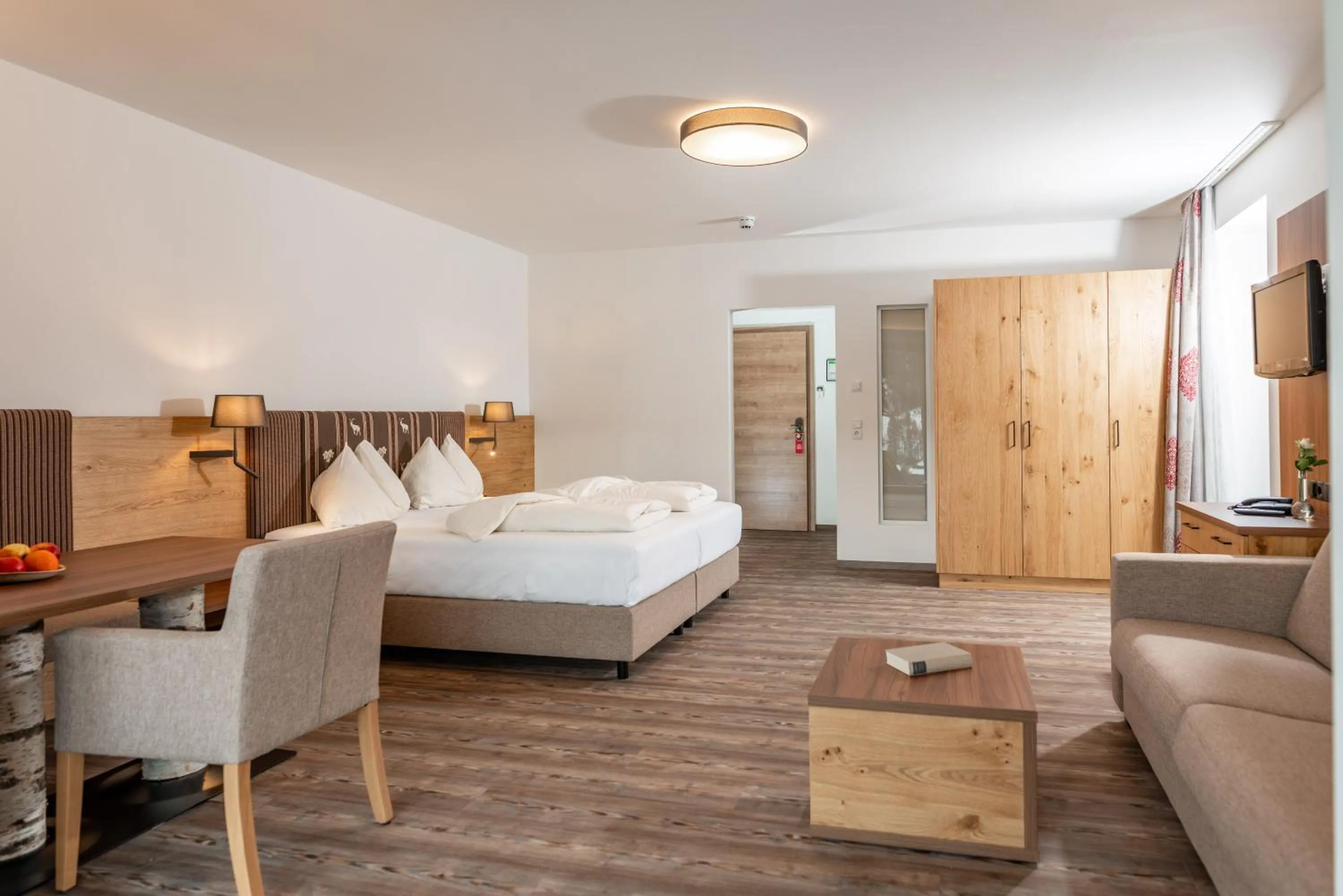 Photo of the whole room, Bed in Aktivhotel Pehab - Dachstein Rooftop-Spa