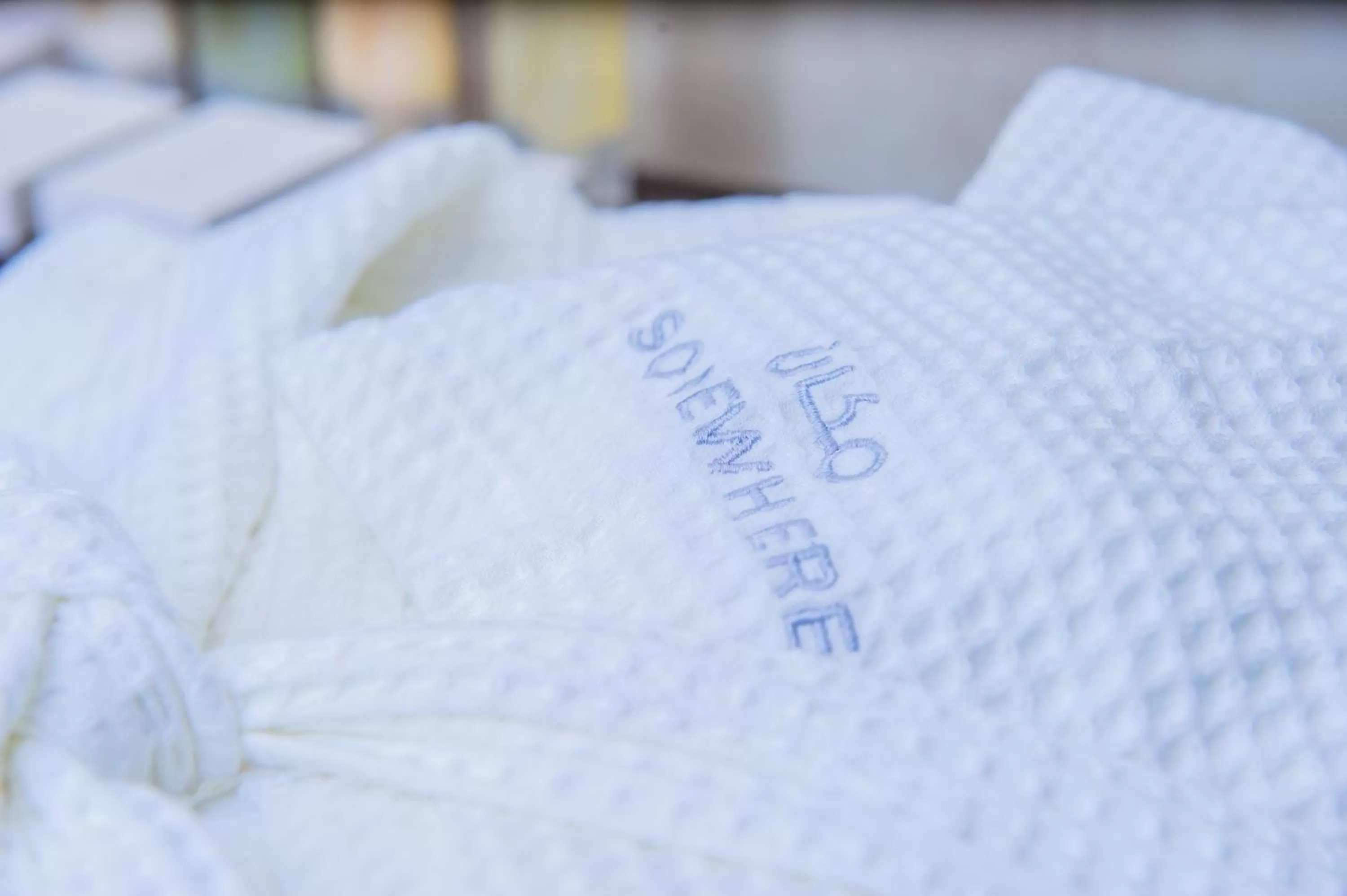 Property logo or sign, Bed in Somewhere Hotel Apartment