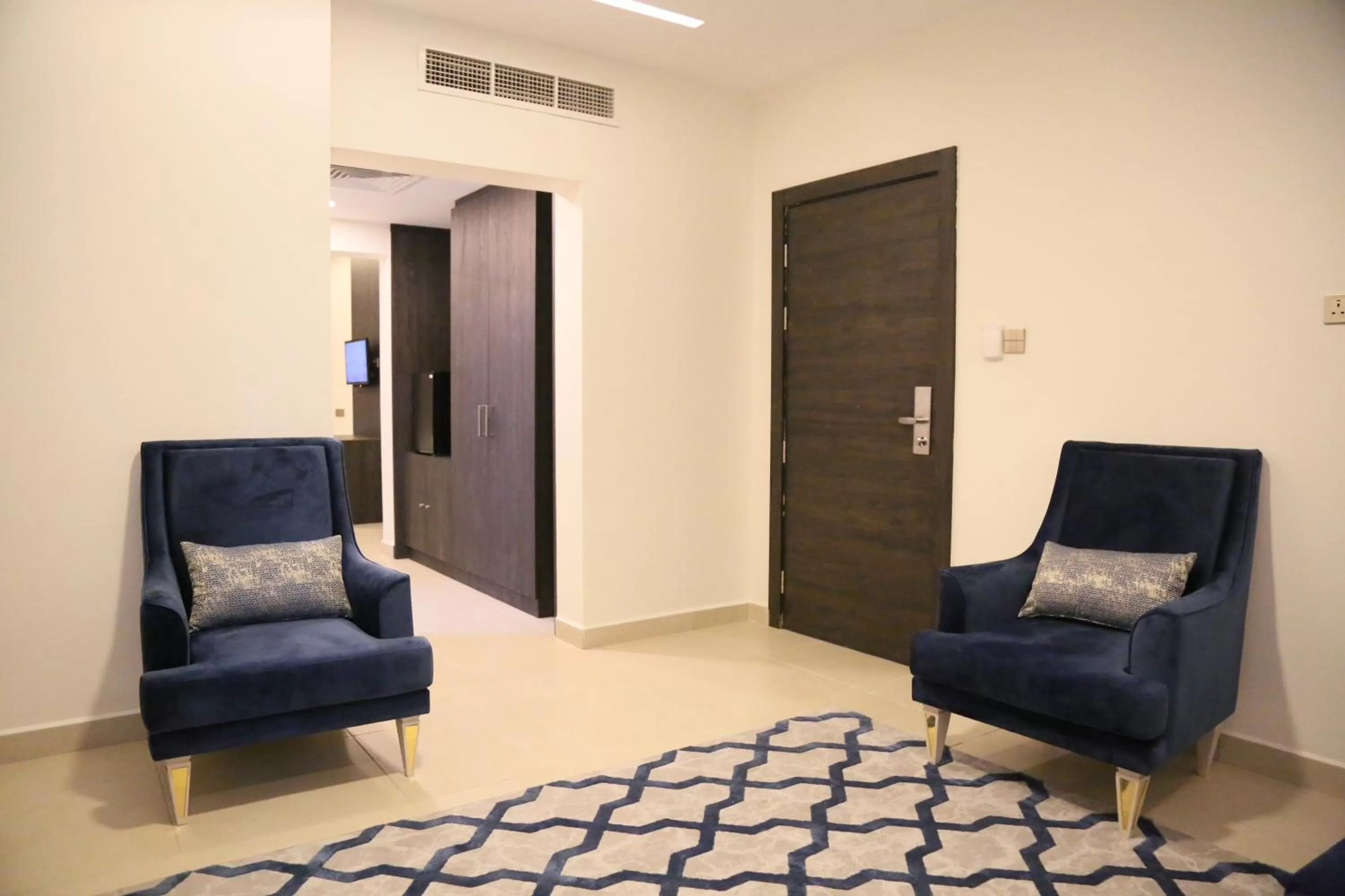 Living room in Manazil Aldar Hotel