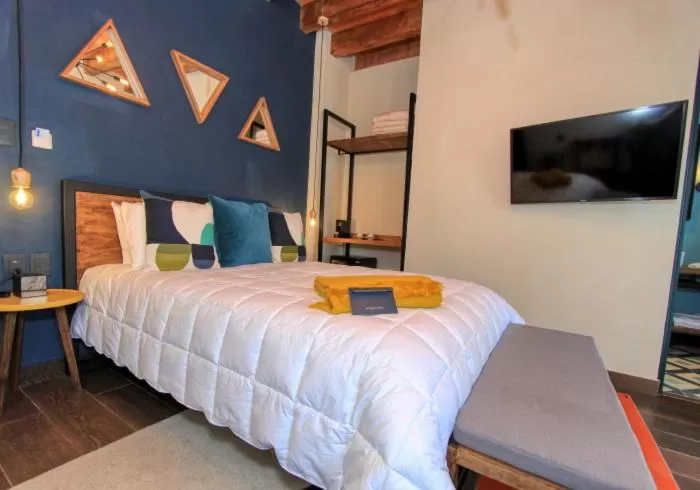 Bed in Antigua Trece Hotel Fusión & SPA