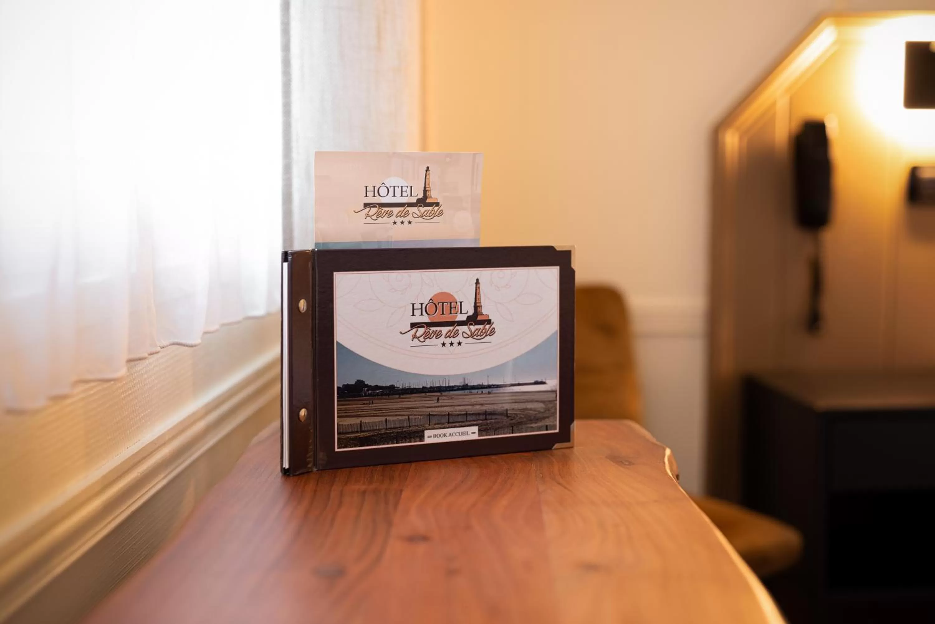 Property logo or sign in Logis Hôtel Rêve de Sable