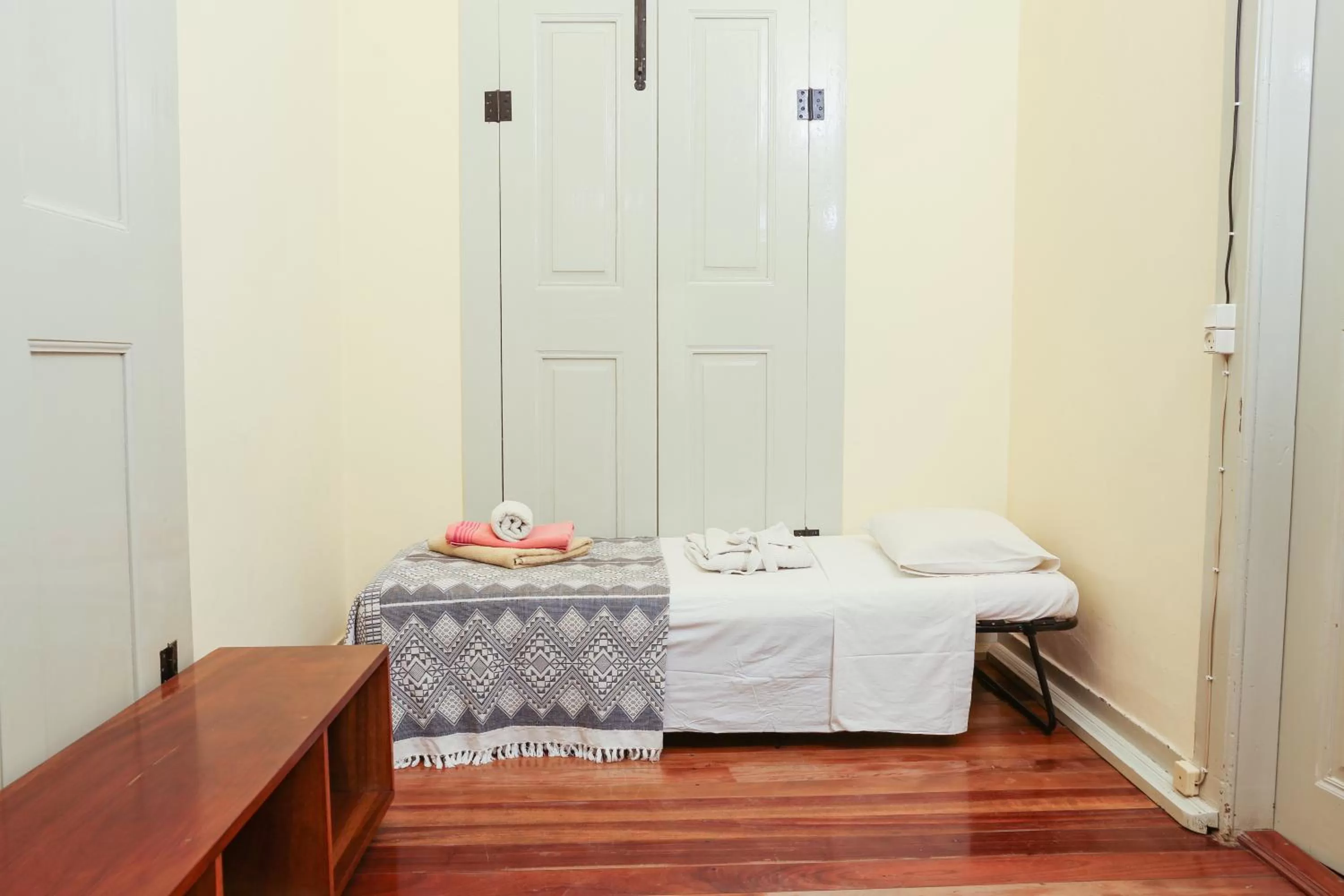 Bed in The Colonial Guest House