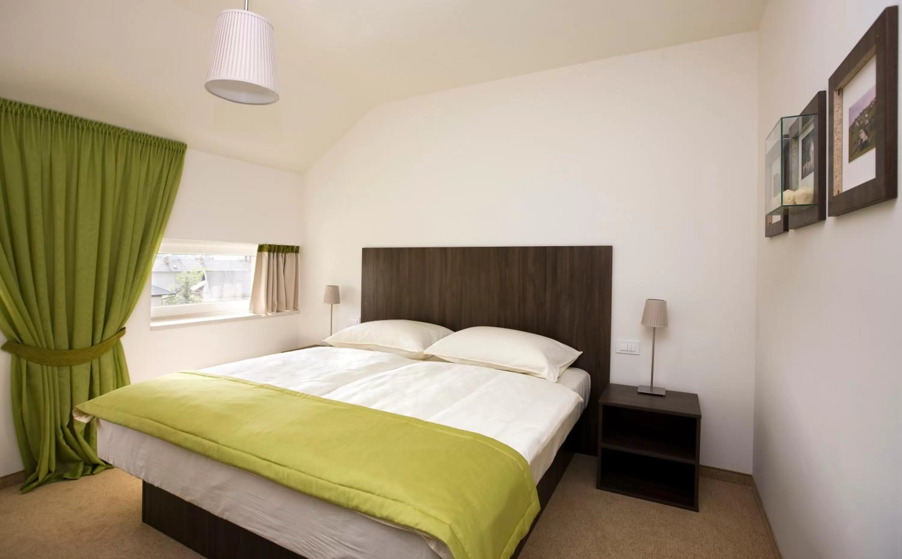 Bed in Ambient Hotel