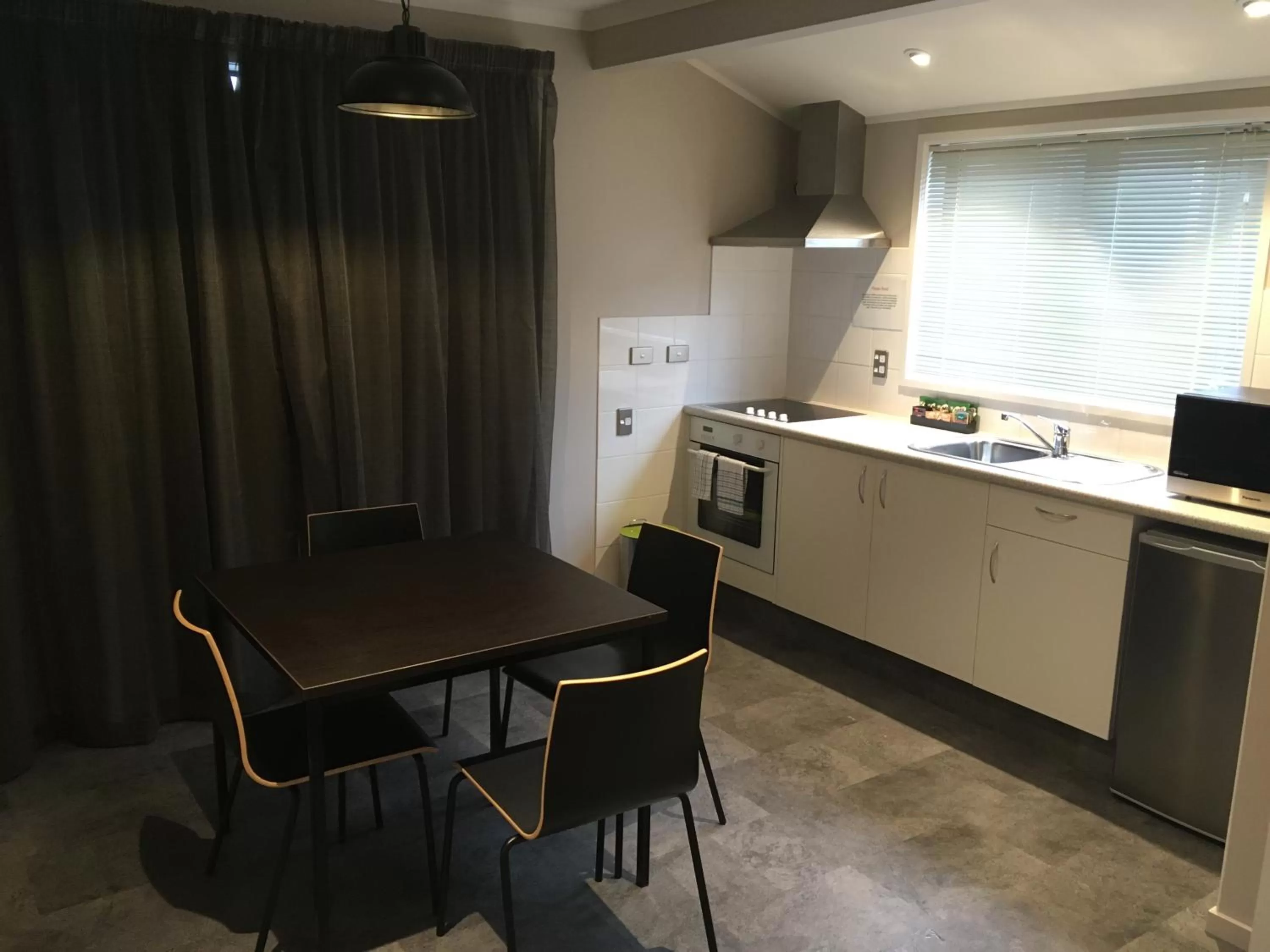 Kitchen or kitchenette in Paroa Hotel