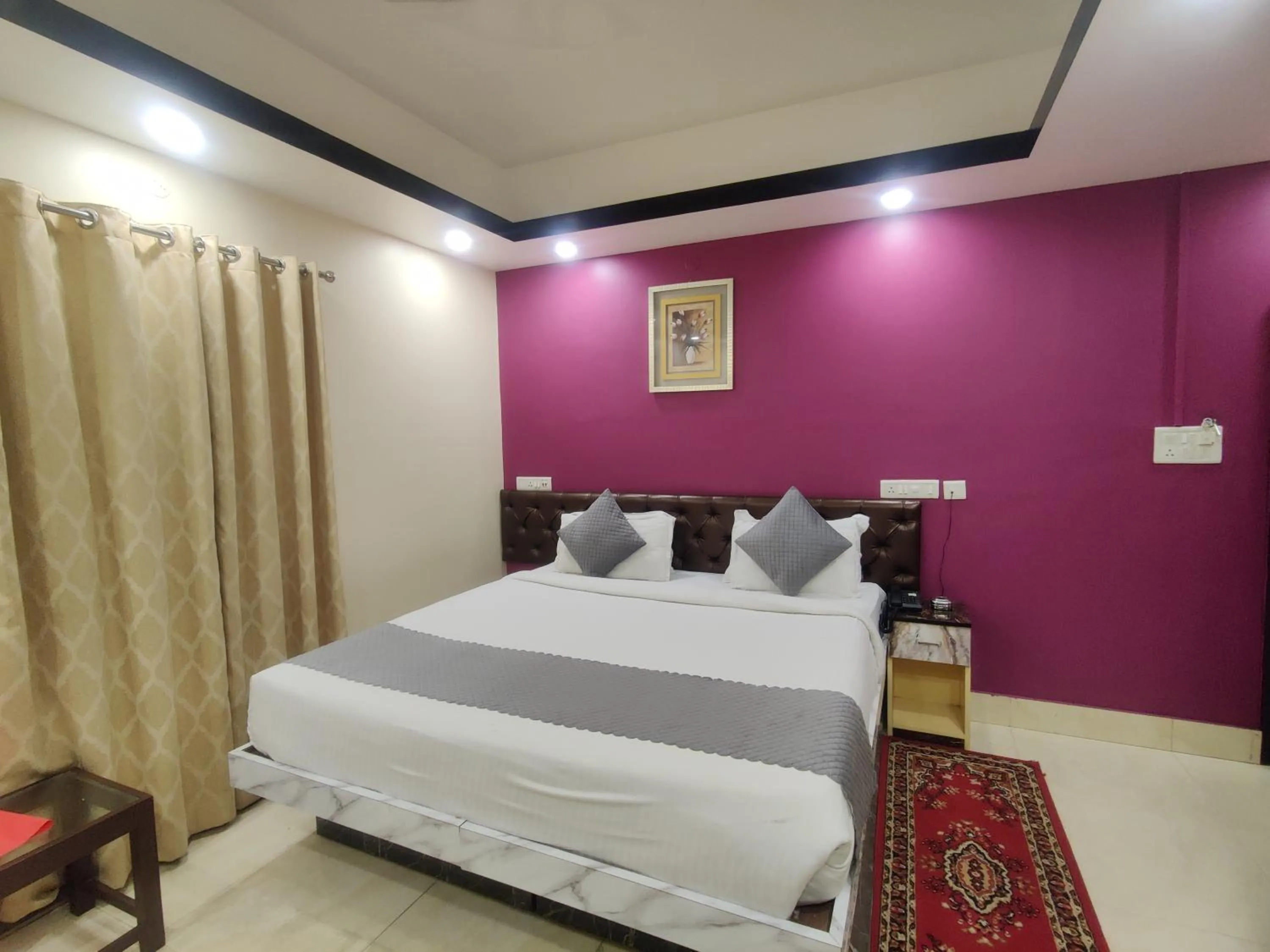 Bed in Hotel Swastik Regency