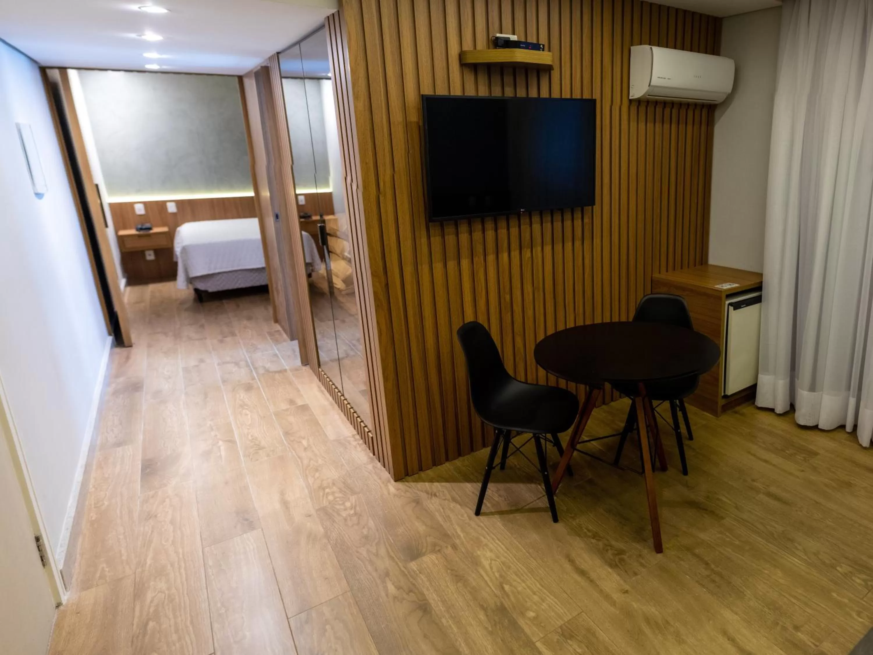 Living room, Bed in VOA Plazza Hotel